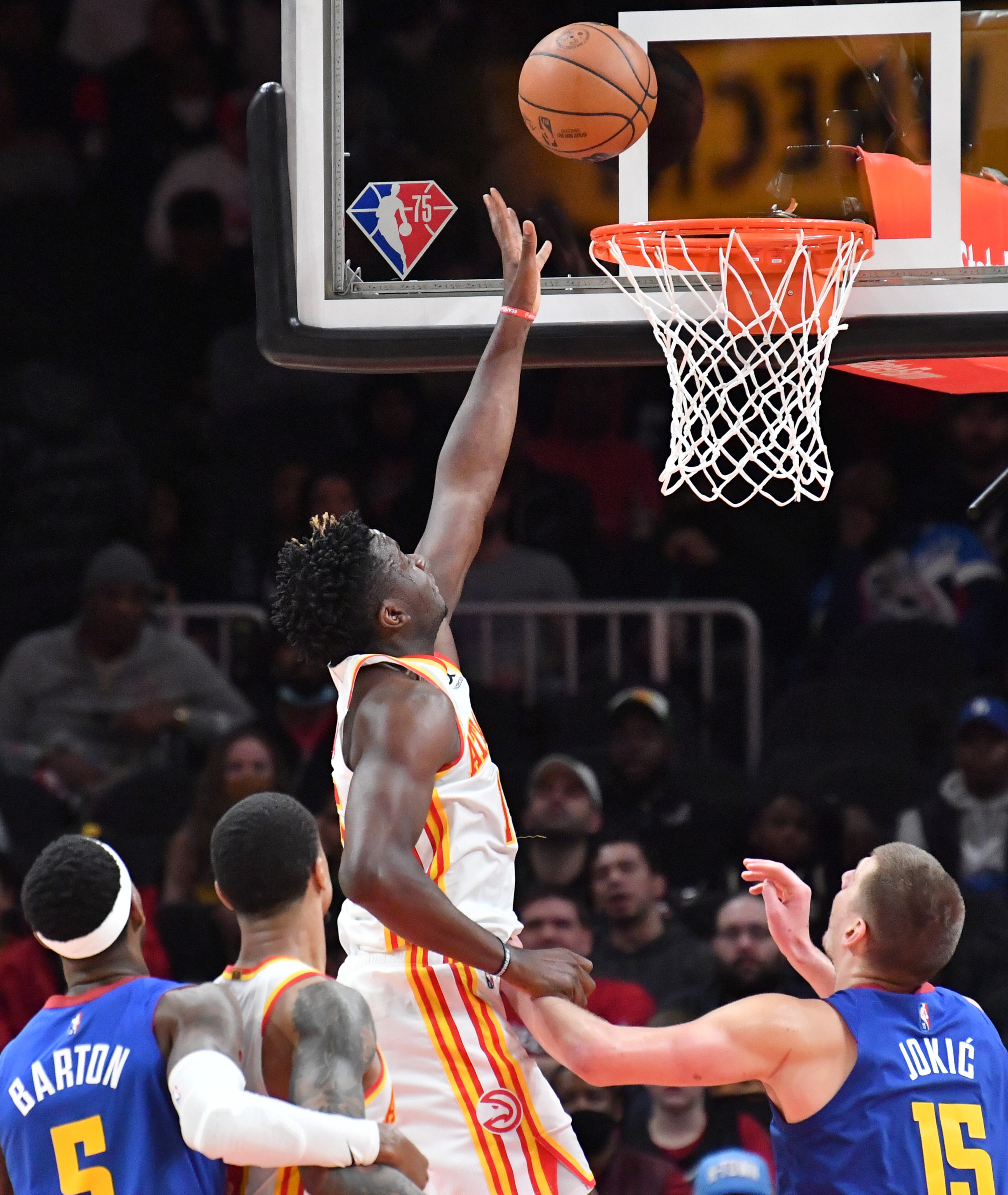 Atlanta Hawks' center Clint Capela (15) goes up for the shot during the second half in an NBA basketball game at State Farm Arena on Friday, December 17, 2021. Denver Nuggets won 133-115 over Atlanta Hawks. (Hyosub Shin / Hyosub.Shin@ajc.com)