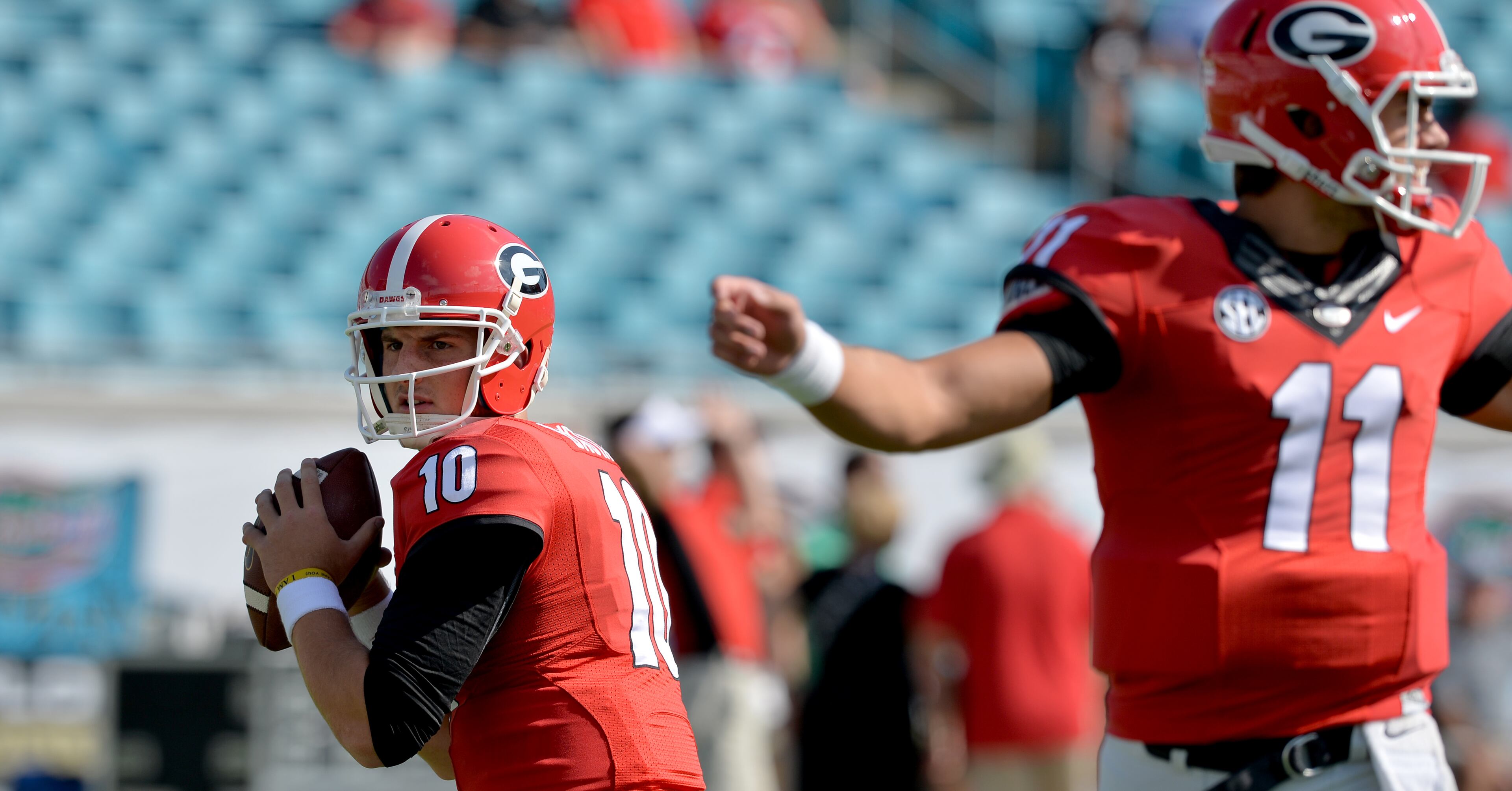 October 31, 2015 Jacksonville, FL: Georgia Bulldogs quarterbacks Faton Bauta, left and Greyson Lambert warm up during pre-game Saturday October 31, 2015 in Jacksonville, FL. Rumors indicate Bauta will start over Lambert for the first time this season. Bata is listed third on the depth chart. BRANT SANDERLIN/BSANDERLIN@AJC.COM
