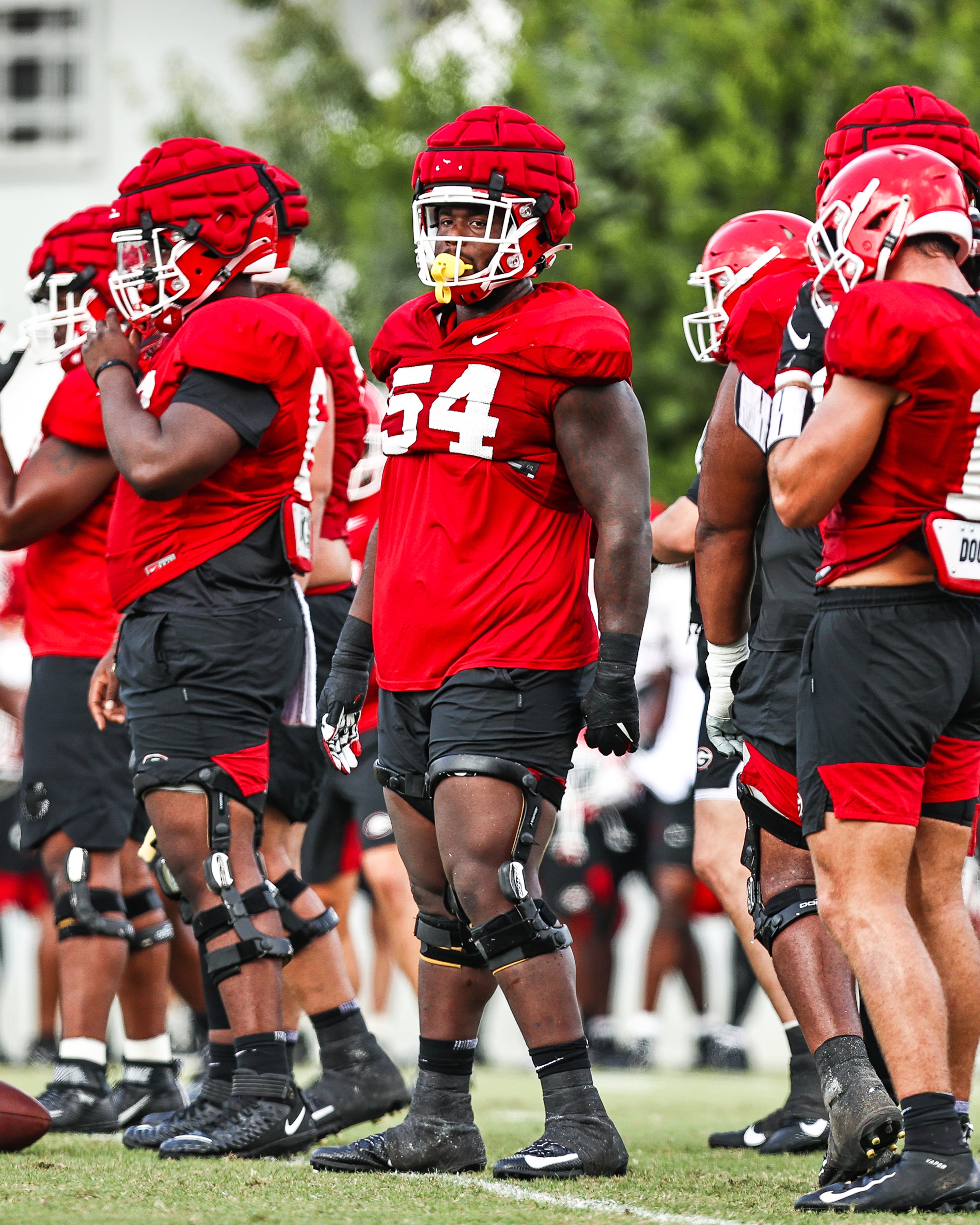 Georgia offensive lineman Justin Shaffer (54) awaits a play call during the Bulldogs’ practice Tuesday, Aug. 24, 2021, in Athens. (Tony Walsh/UGA)