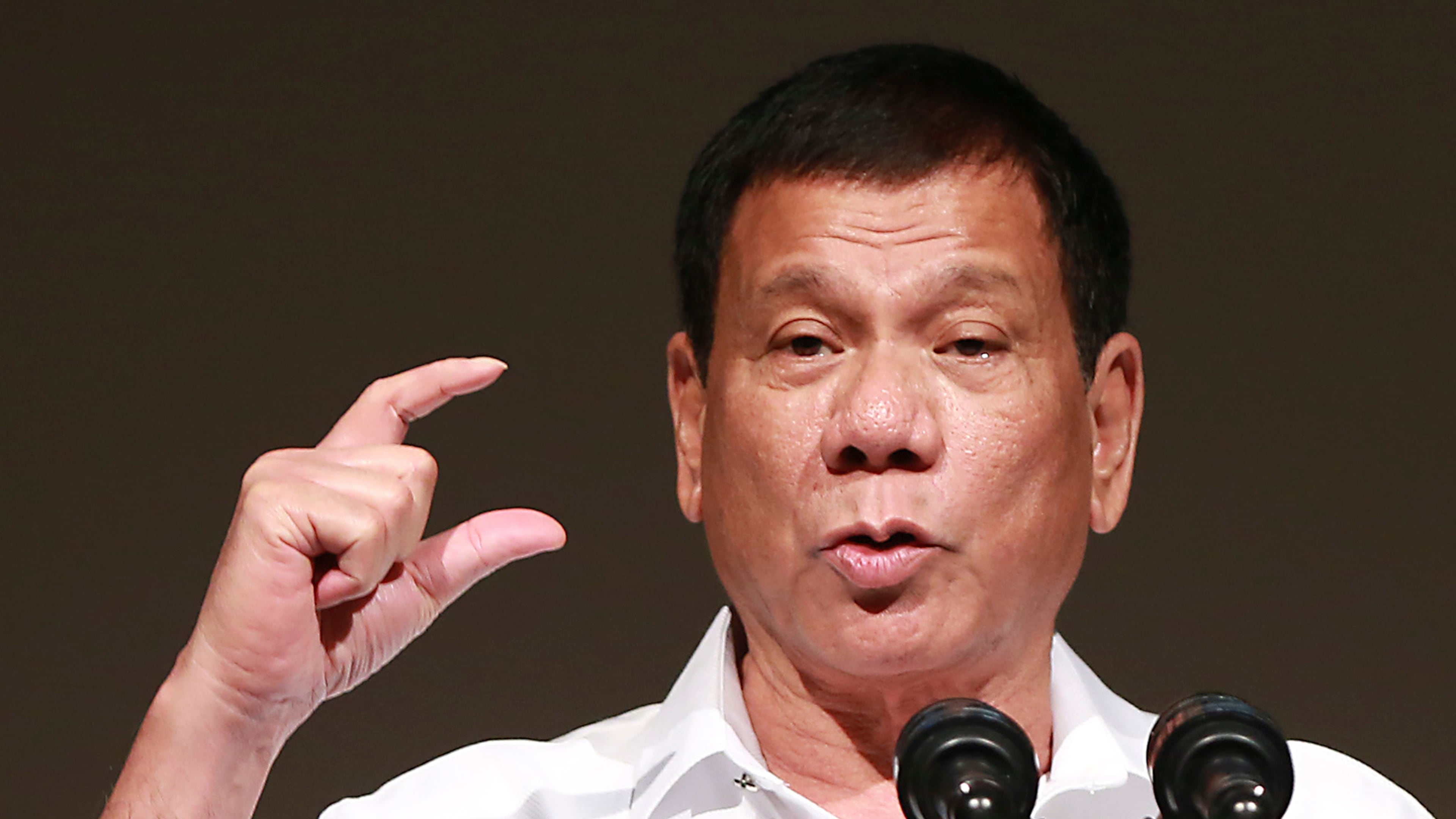 FILE - In this Oct. 26, 2016 file photo, Philippine President Rodrigo Duterte delivers a speech at the Philippine Economic Forum in Tokyo. (AP Photo/Eugene Hoshiko, File)