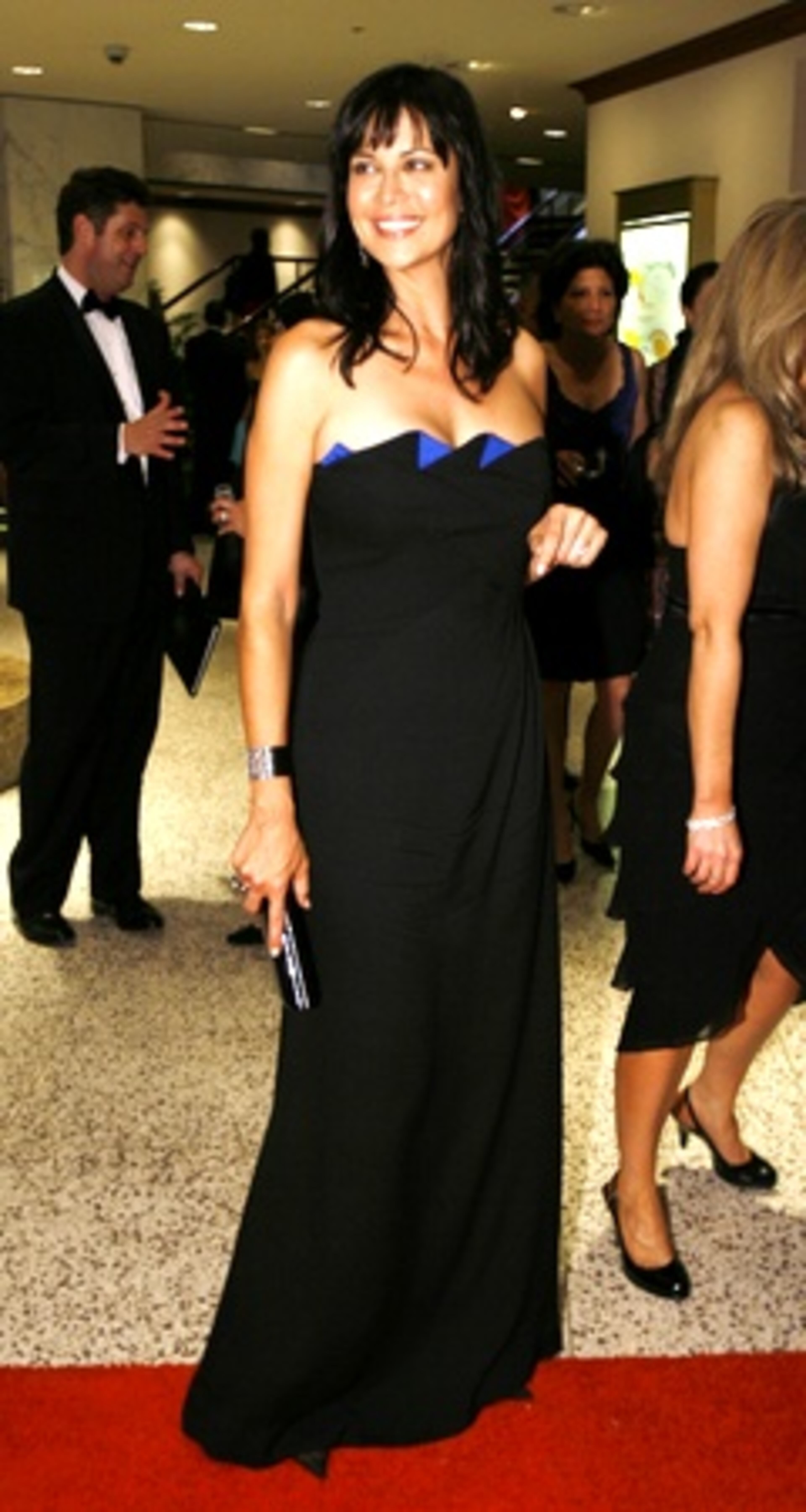 "ARMY WIFE" Catherine Bell goes way off-base to attend the dinner.