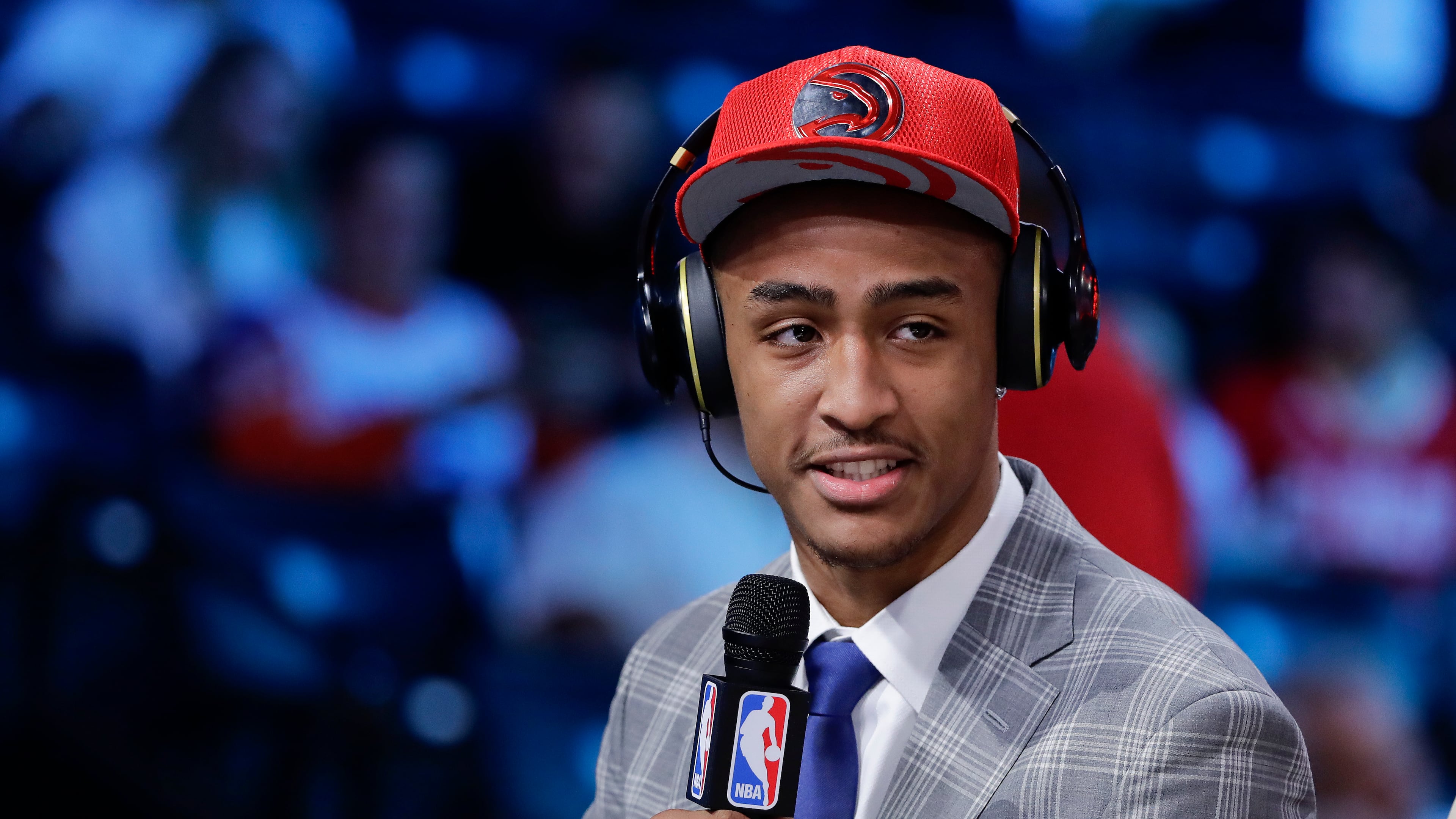 John Collins answers questions during an interview after being selected by the Atlanta Hawks as the 19th pick overall during the NBA basketball draft, Thursday, June 22, 2017, in New York. (AP Photo/Frank Franklin II)
