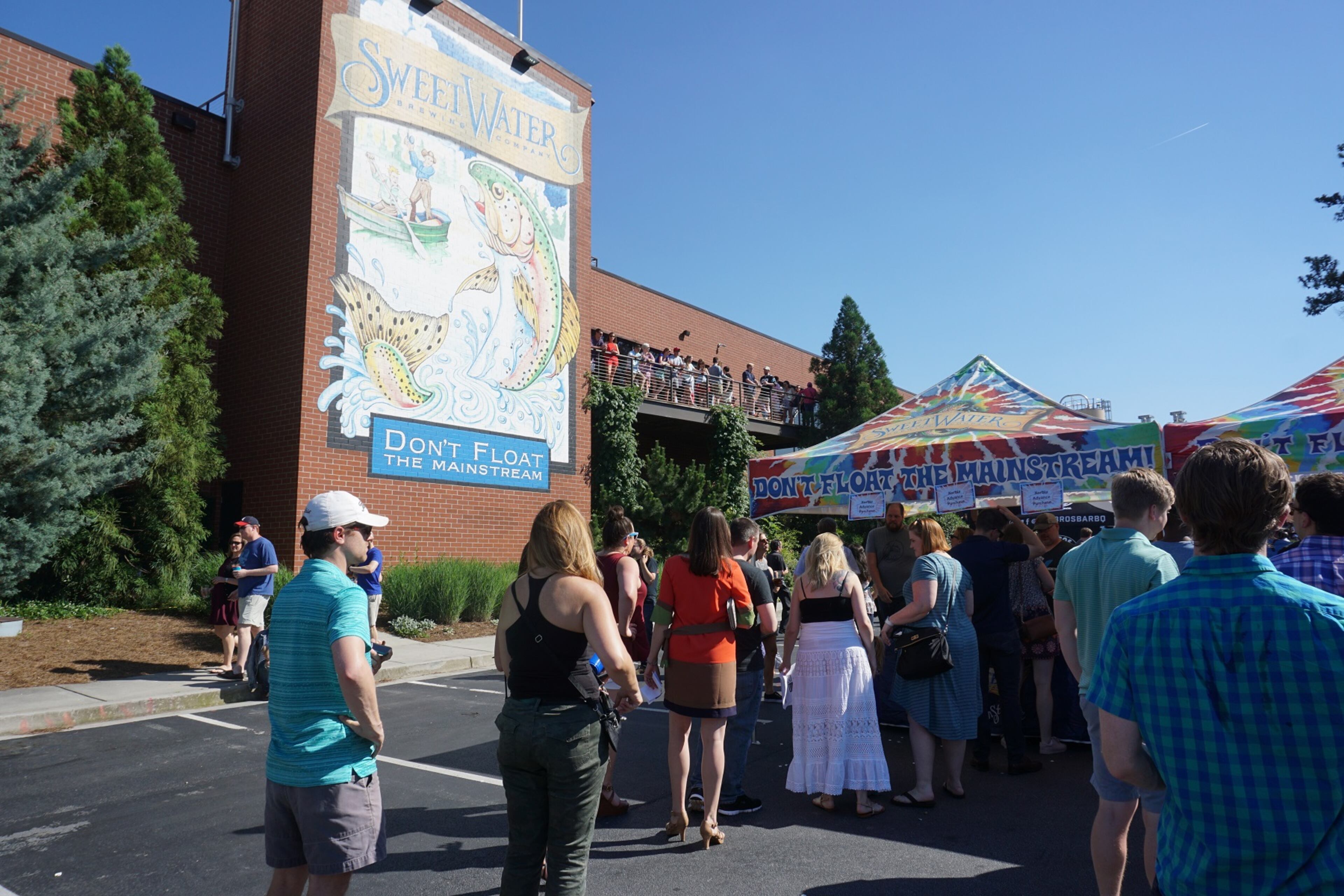 Atlantans gathered in celebration of I-85 in Buckhead's reopening at SweetWater Brewing Company on Friday, May 26, 2017.