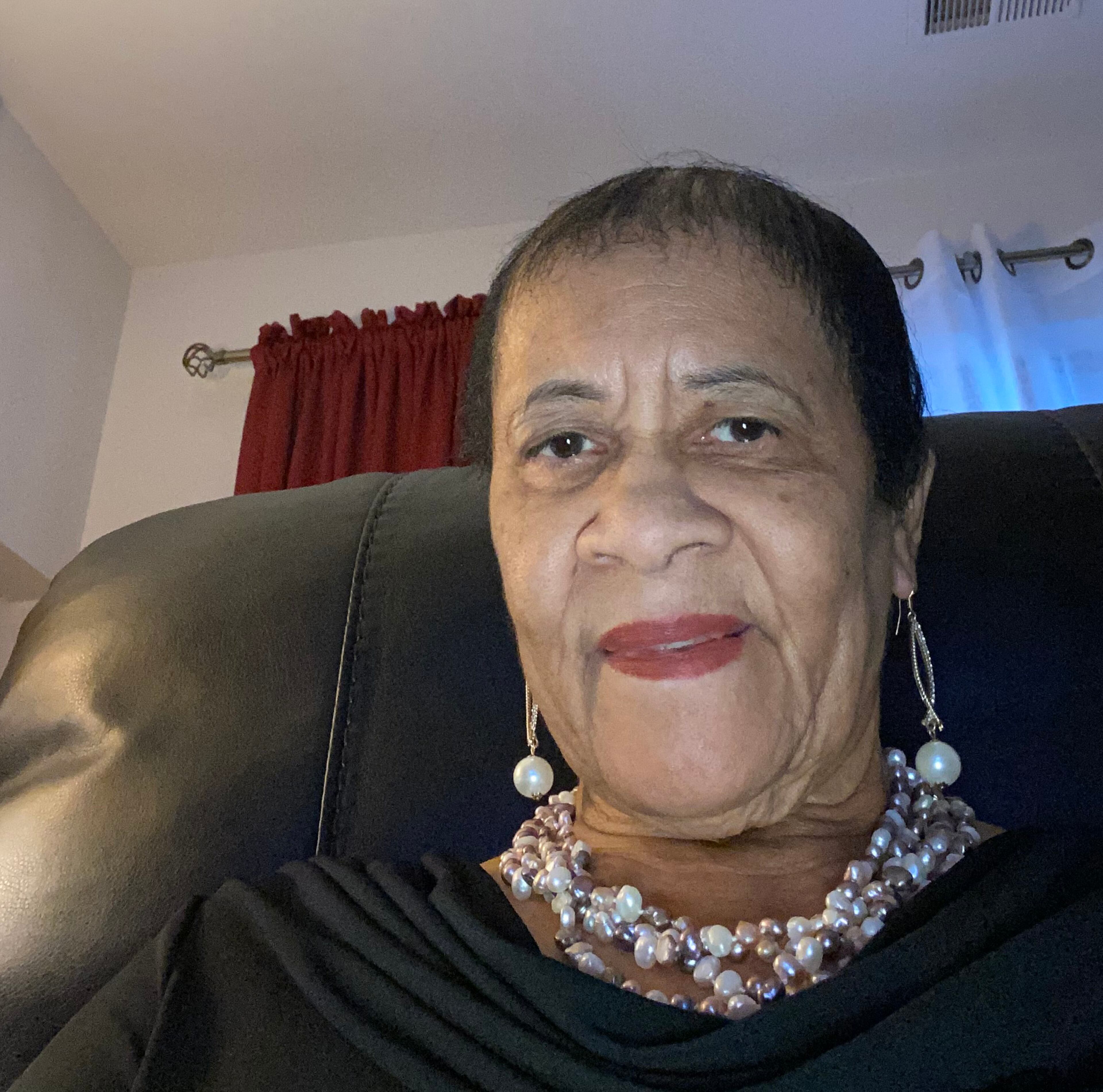 Deborah Simms. Glen Burnie, Maryland
The pearls were given to me as a gift and the picture you see is the first time I have worn them. It is a honor to wear them on January 20 in recognition of the Honorable Vice President Kamala Harris. The importance to me is because she is the first woman and woman of color to be nominated for this most prestigious position. I wear the pearls to honor her. She deserves pearls and so much more. Her beauty radiates inside out.