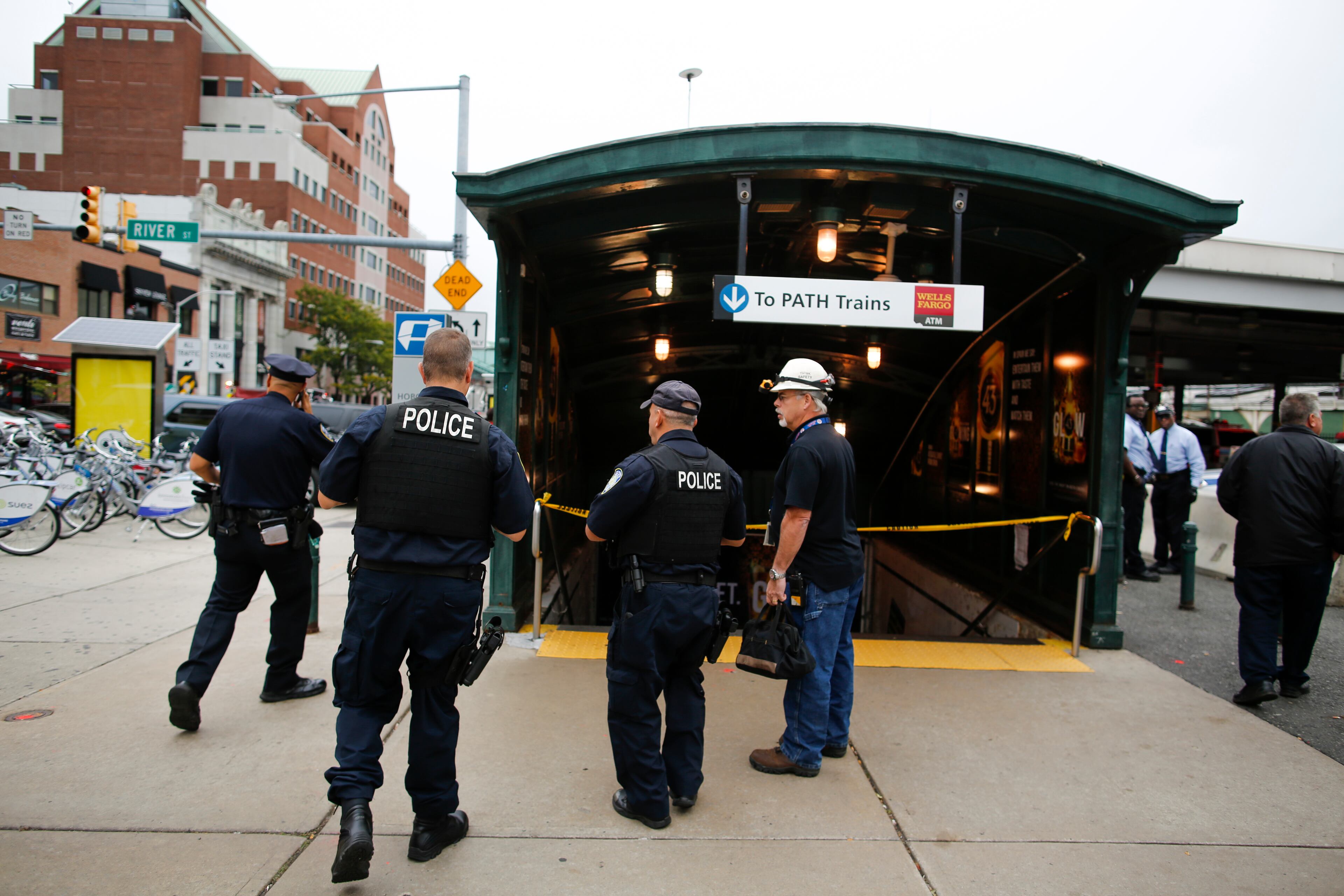 NJ Police officers arrive to the train terminal after a New Jersey Transit train crashed into the platform at Hoboken Terminal during morning rush hour September 29, 2016 in Hoboken, New Jersey. According to reports, 3 people have been killed and over 100 injured. (Photo by Eduardo Munoz Alvarez/Getty Images)