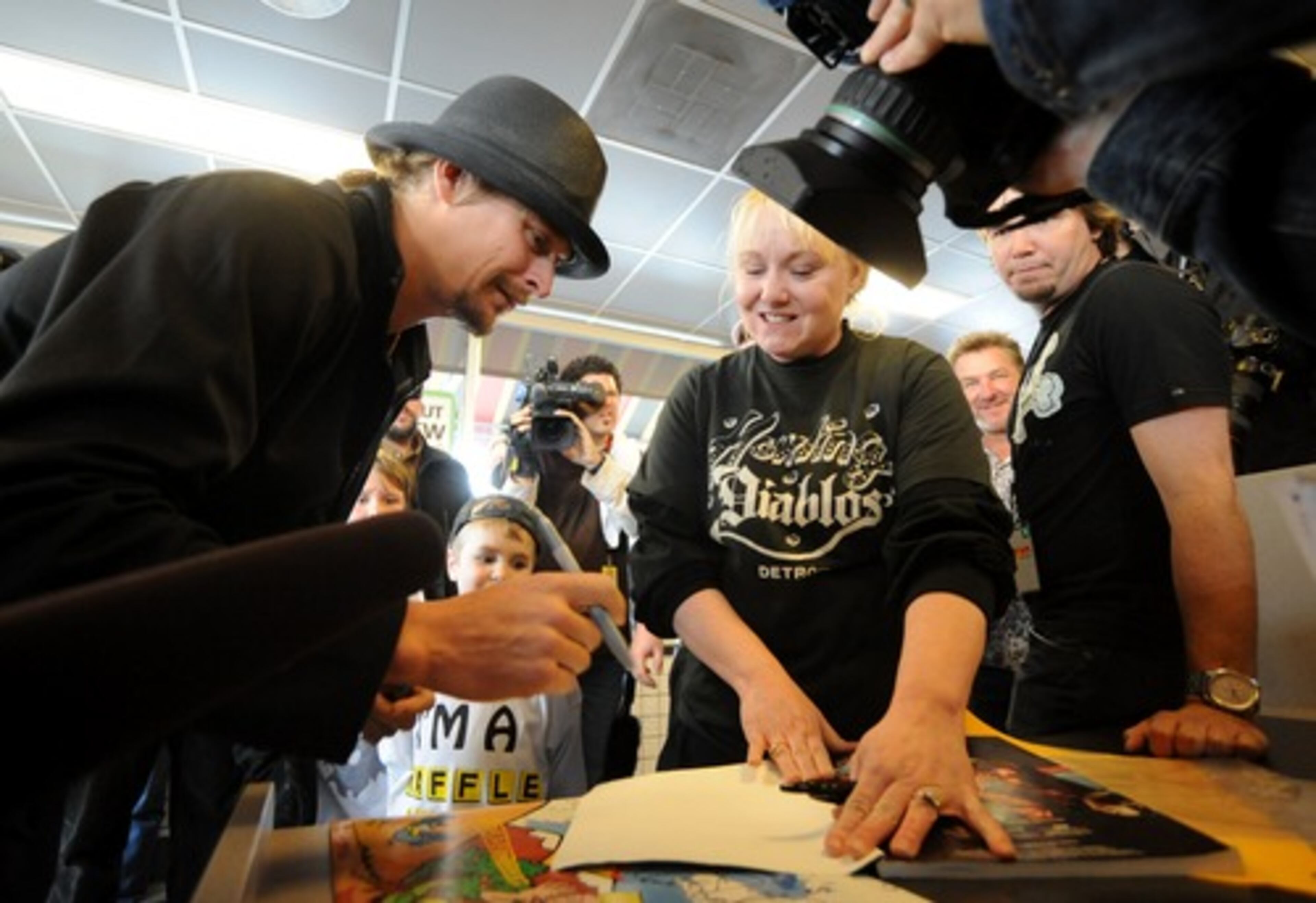 The combative but still gracious "hick-hopper" Kid Rock was in Atlanta for a concert and a fund-raiser in March 2008. He appeared at a Duluth Waffle House to sign autographs, like this one for Alisha Mullen of Point Pleasant, W.V.