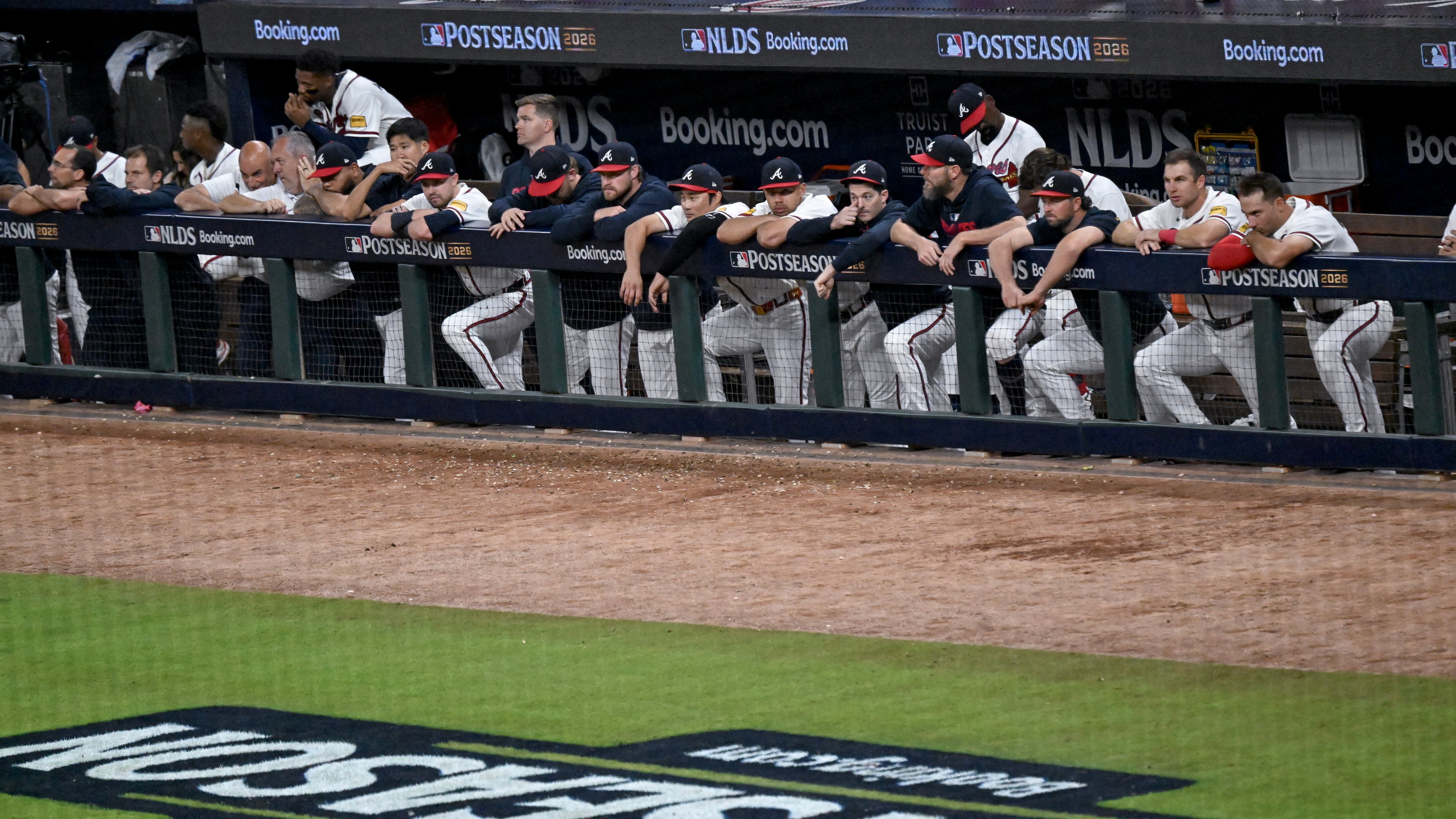 The Atlanta Braves watch from the dugout during the ninth inning of Game 4 of the MLB National League Division Series versus the Los Angeles Dodgers, Wednesday, Oct. 7, 2026, in Atlanta. The Dodgers defeated the Braves 3 games to 1. (Hyosub Shin/AJC)