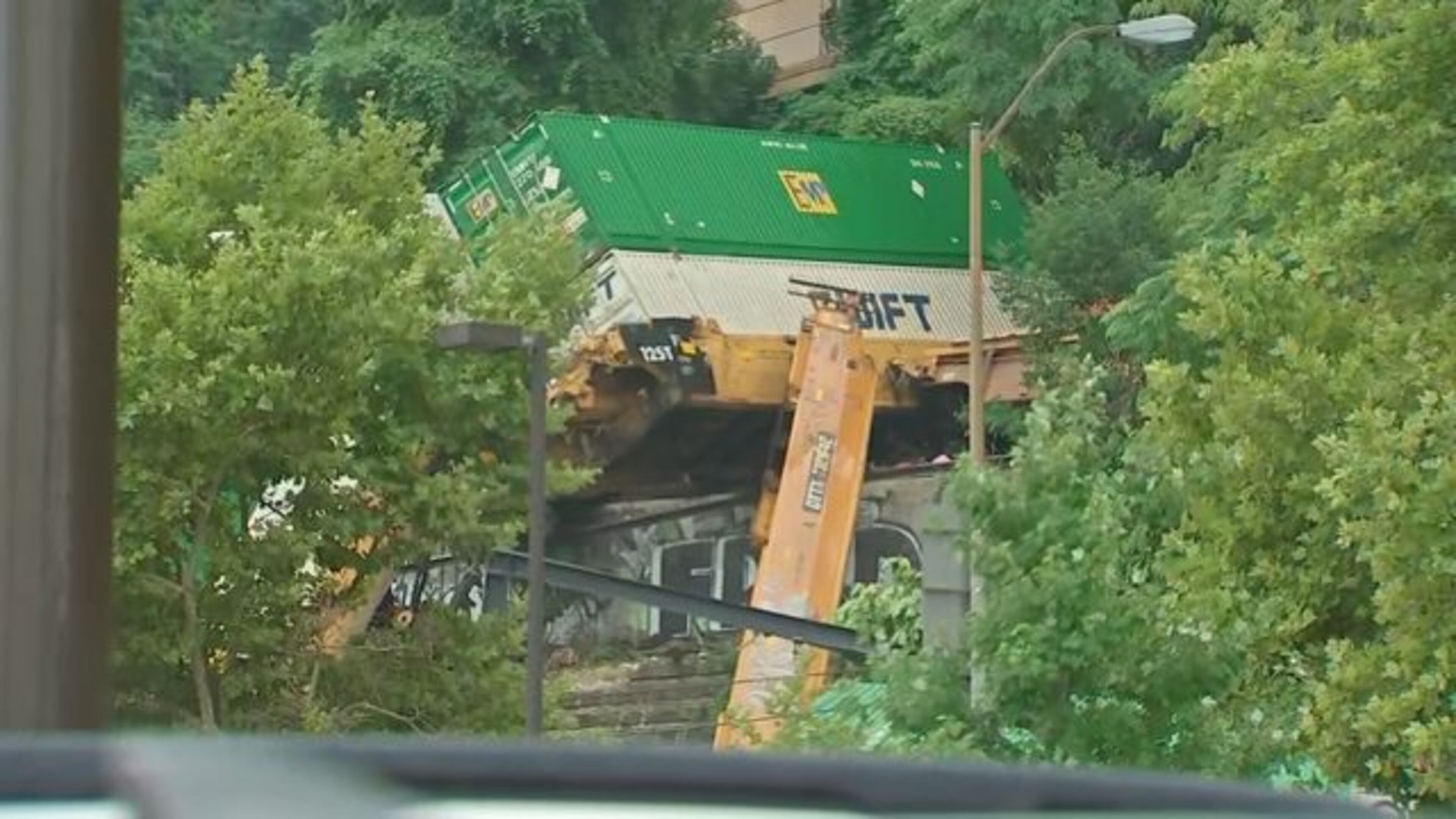 Four cars from a freight train derailed in Pittsburgh on Sunday.