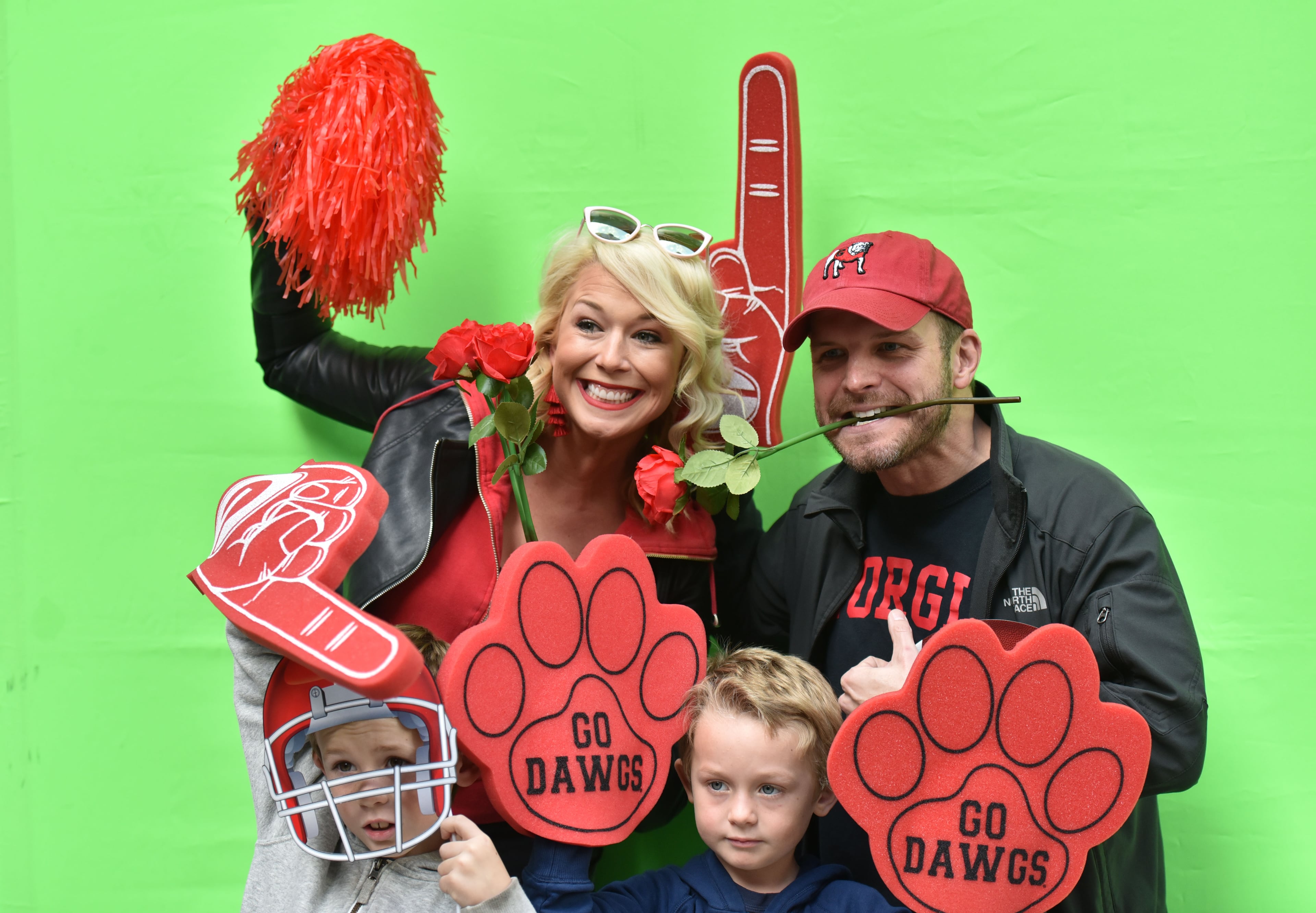 December 31, 2017 Los Angeles, California - Connor Flagel (center), of Marietta, plays a game of corn hole during the Rose Bowl Bash in downtown Los Angeles on Sunday, December 31, 2017. Hyosub Shin / hshin@ajc.com