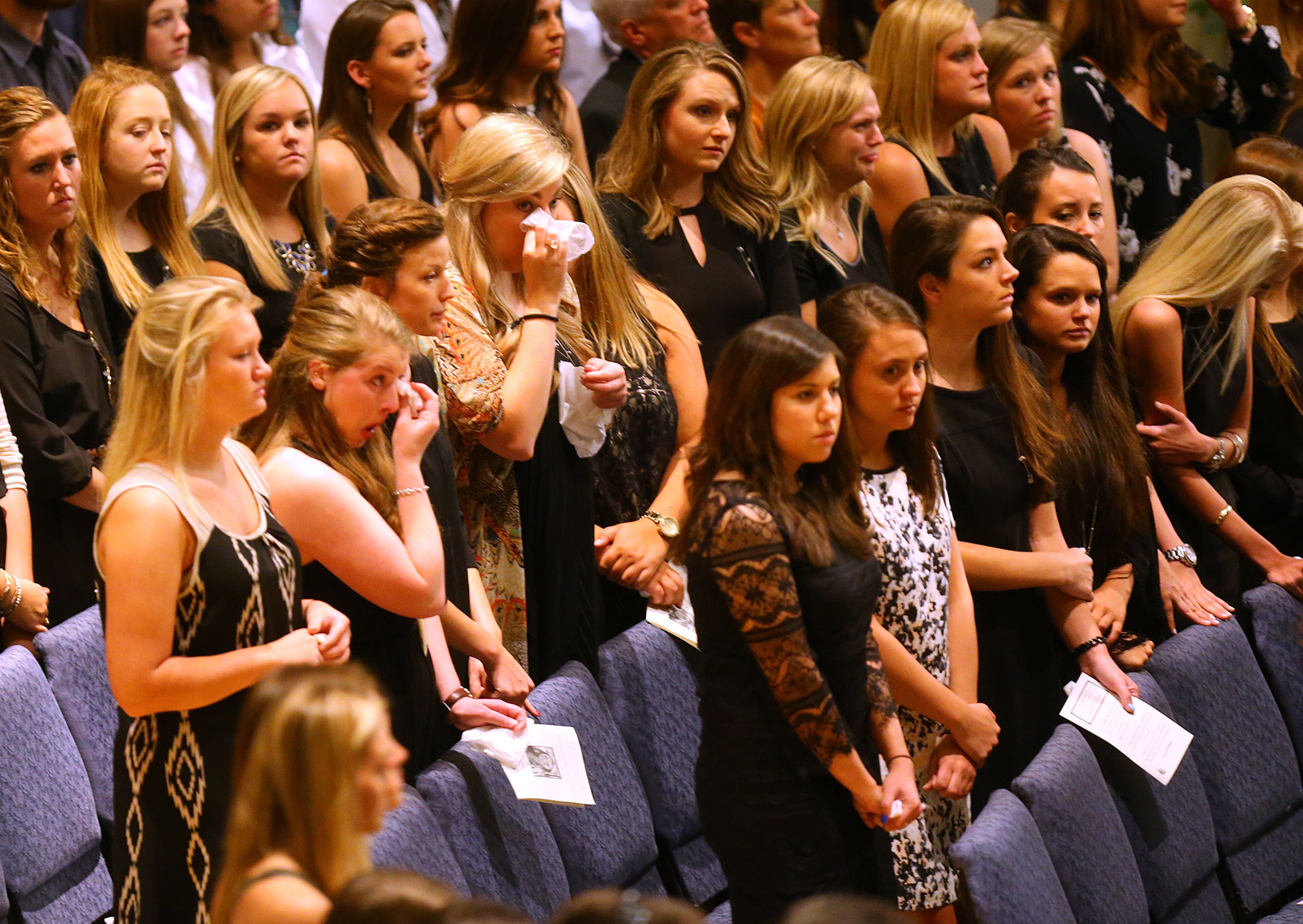 Friends are moved to tears druing a service of praise and celebration for the life of Emily Elizabeth Clark at Burnt Hickory Baptist Church on Sunday, April 26, 2015, in Powder Springs. Clark and four other nursing students from Georgia Southern University were killed in a multi-vehicle accident while fulfilling course work in their nursing program last week. Curtis Compton / ccompton@ajc.com