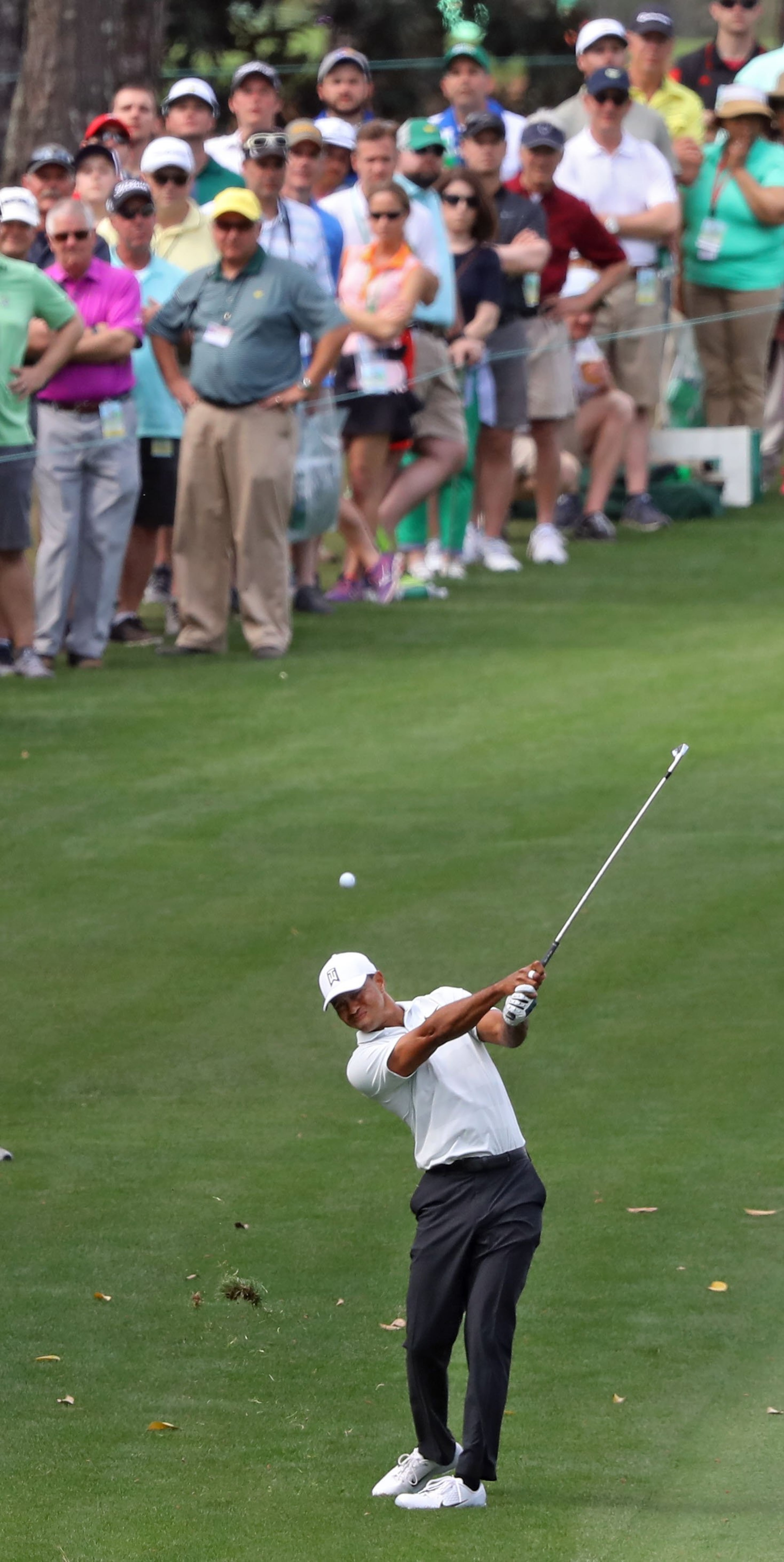 4/6/18 - Augusta - Tiger Woods hits his fairway shot on 10 during the second round of the Masters at Augusta National Golf Club on Friday, April 6, 2018, in Augusta. Curtis Compton/ccompton@ajc.com