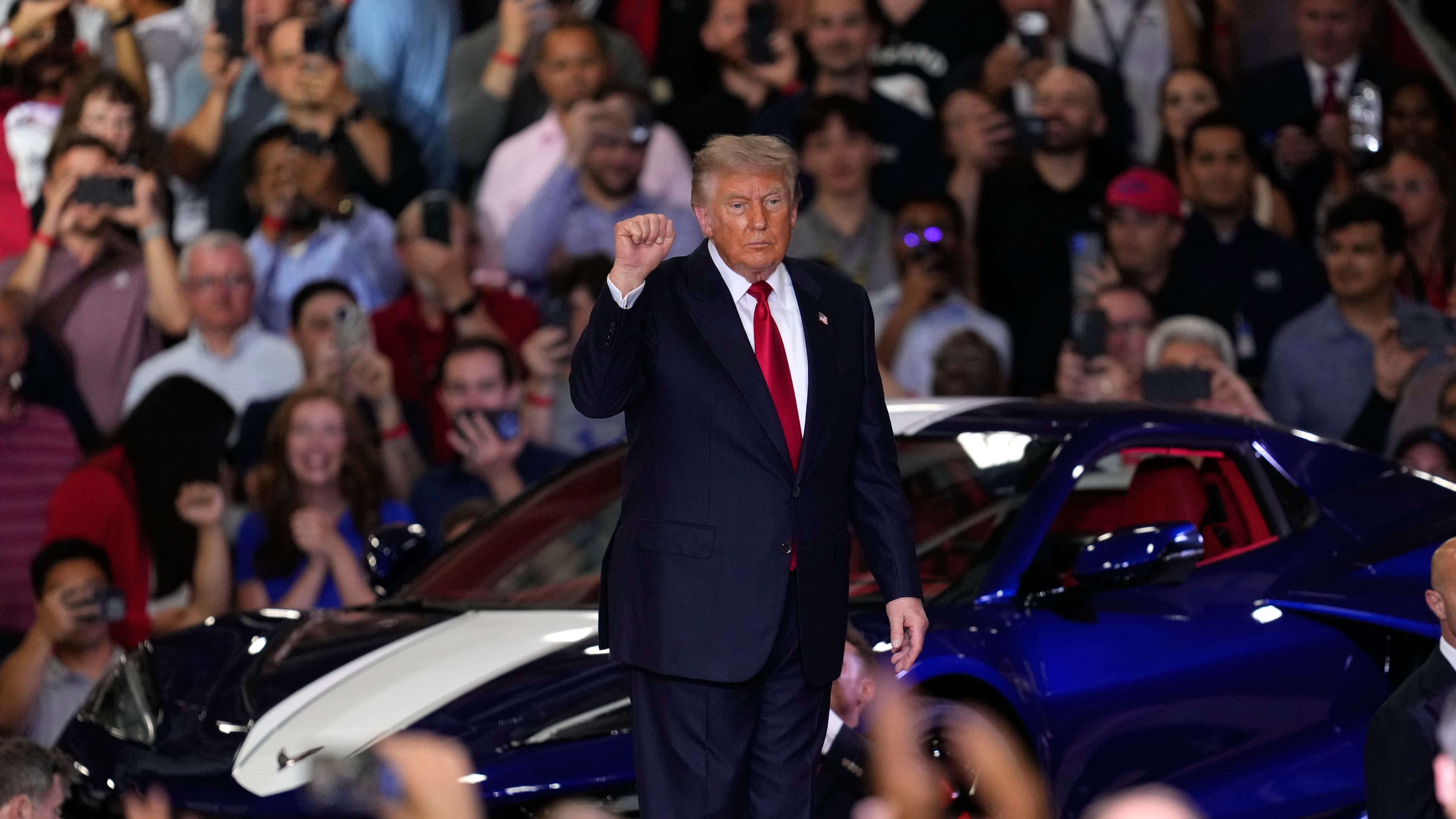 President Donald Trump arrives to speak at an event at the General Motors Proving Ground Monday, July 27, 2026, in Milford, Mich. (AP Photo/Paul Sancya)
