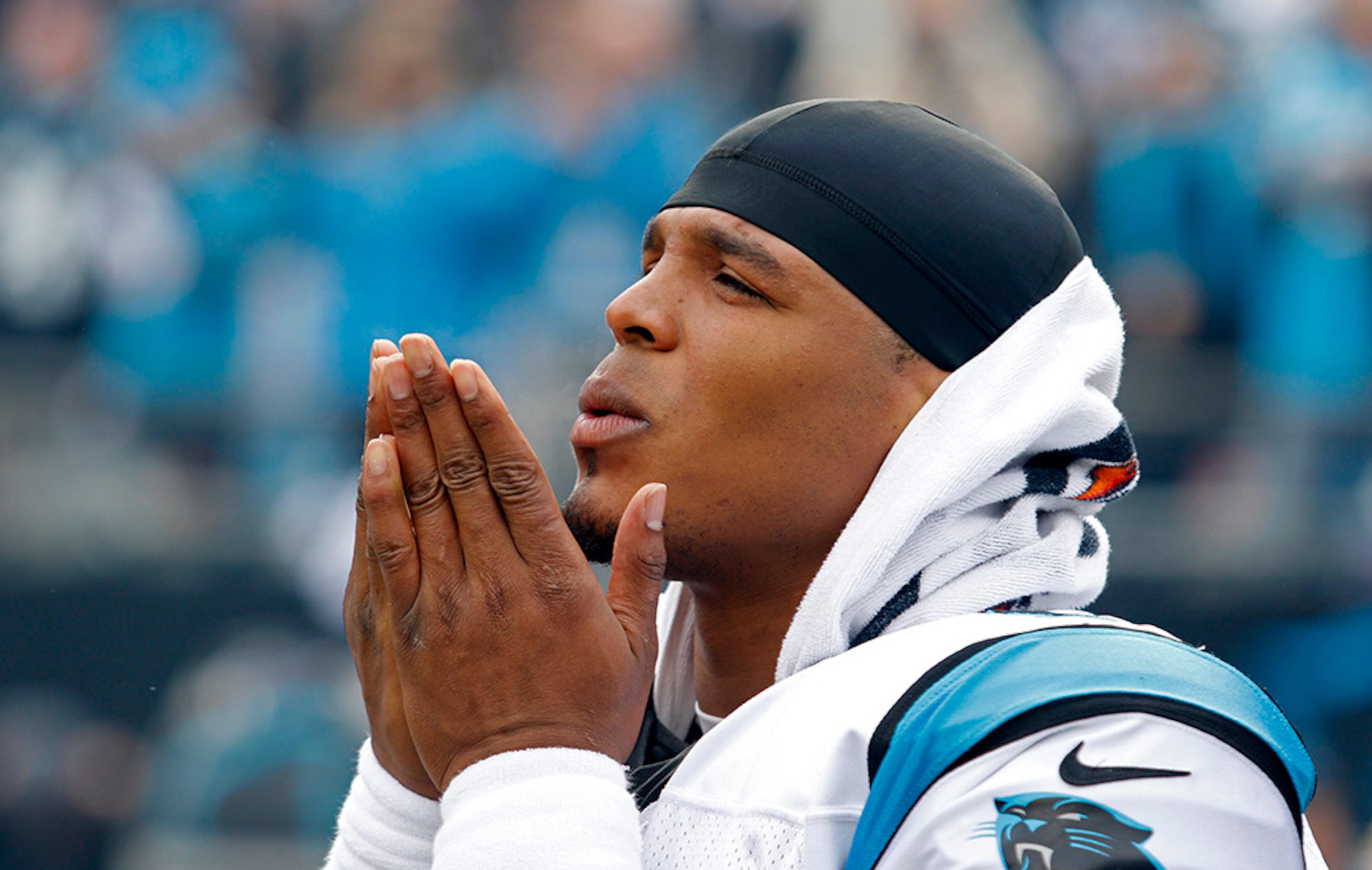 Over/under on the number of towels on Cam Newton uses to cover his body at once: 2.5