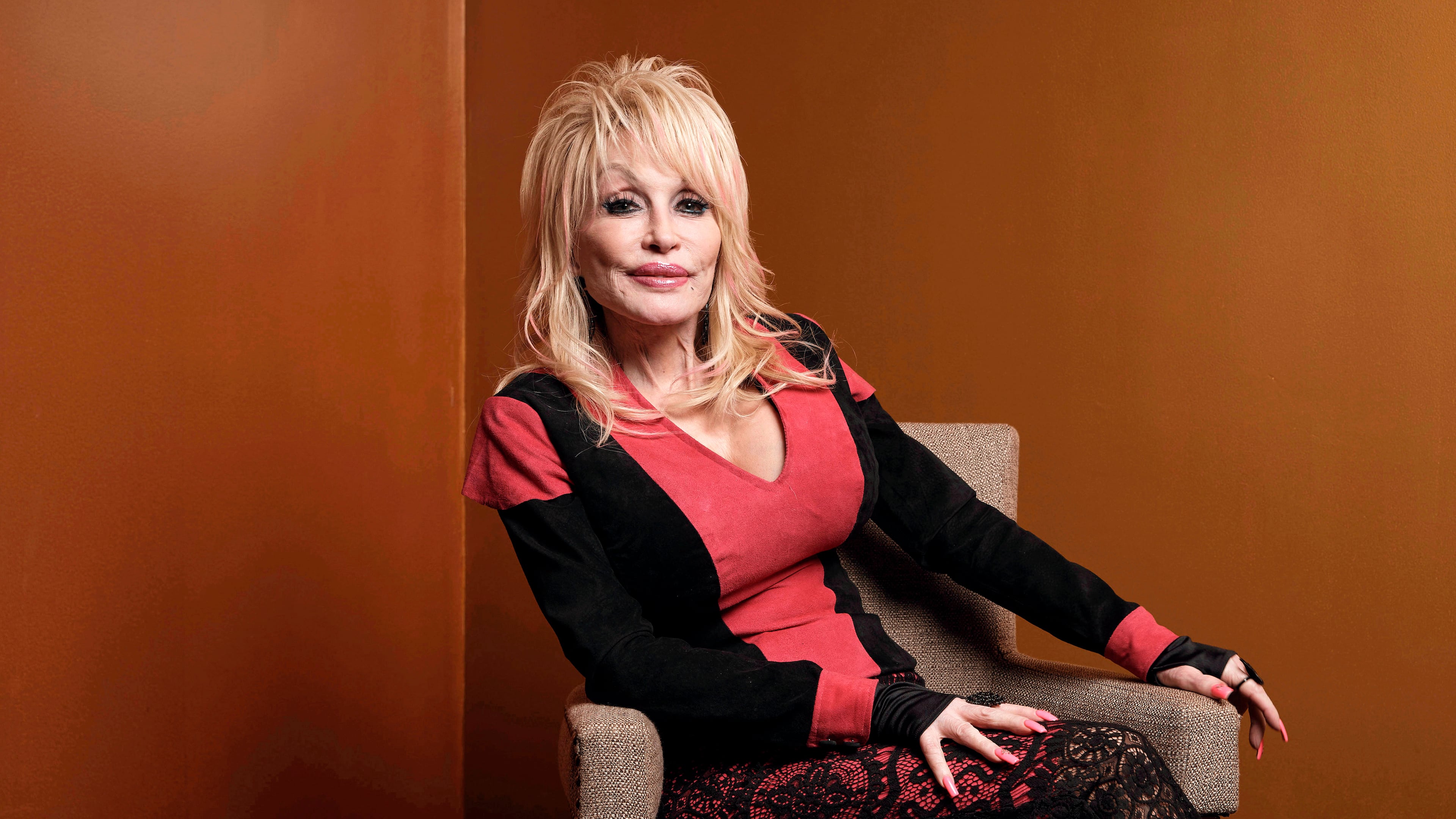 FILE - Dolly Parton poses at the Carnegie Medal of Philanthropy Ceremony in New York, on Oct. 13, 2022. (AP Photo/Andres Kudacki, File)