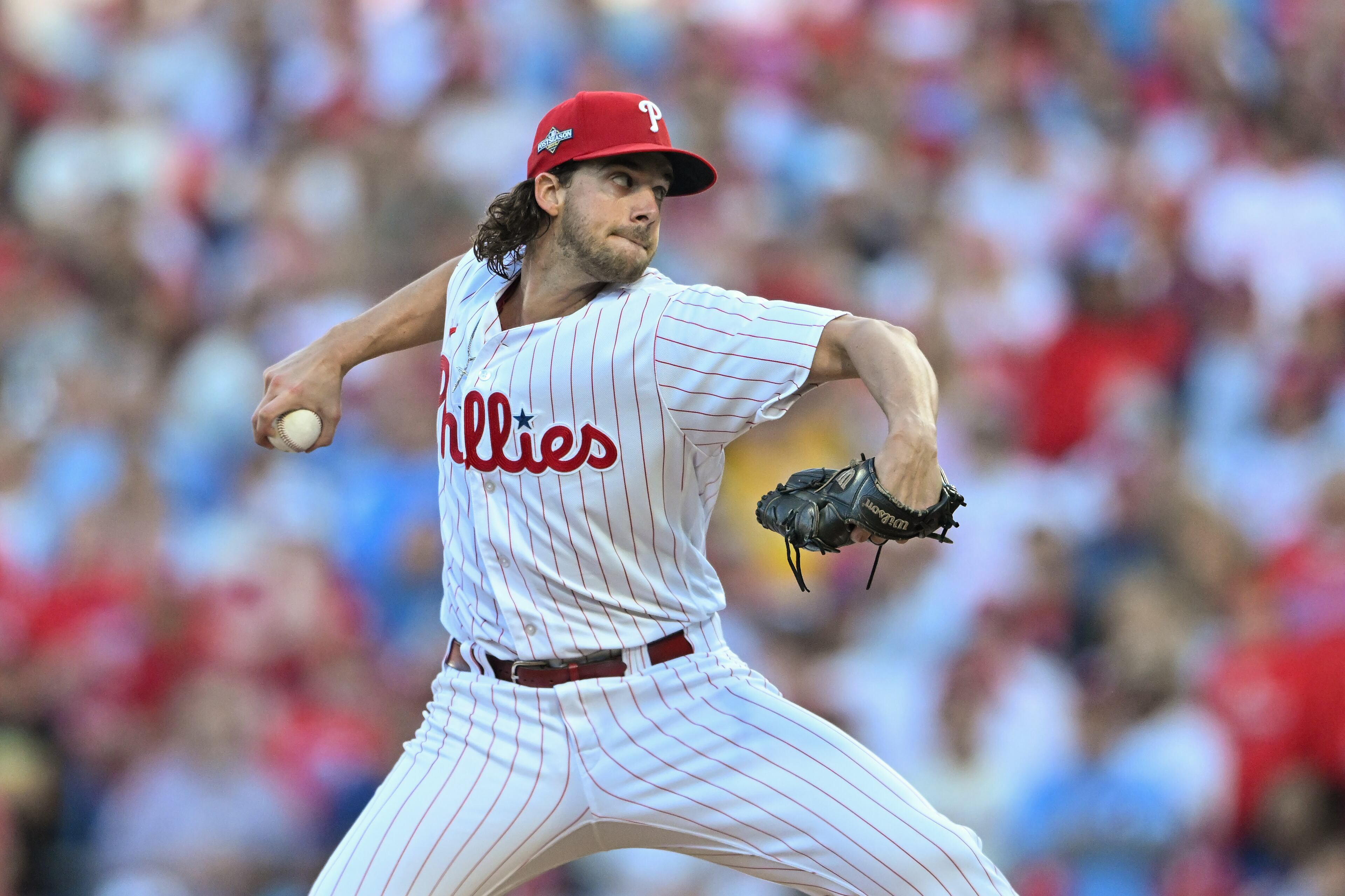 Philadelphia Phillies starting pitcher Aaron Nola (27) delivers to the Atlanta Braves during the first inning of NLDS Game 3 in Philadelphia on Wednesday, Oct. 11, 2023. (Hyosub Shin / Hyosub.Shin@ajc.com)