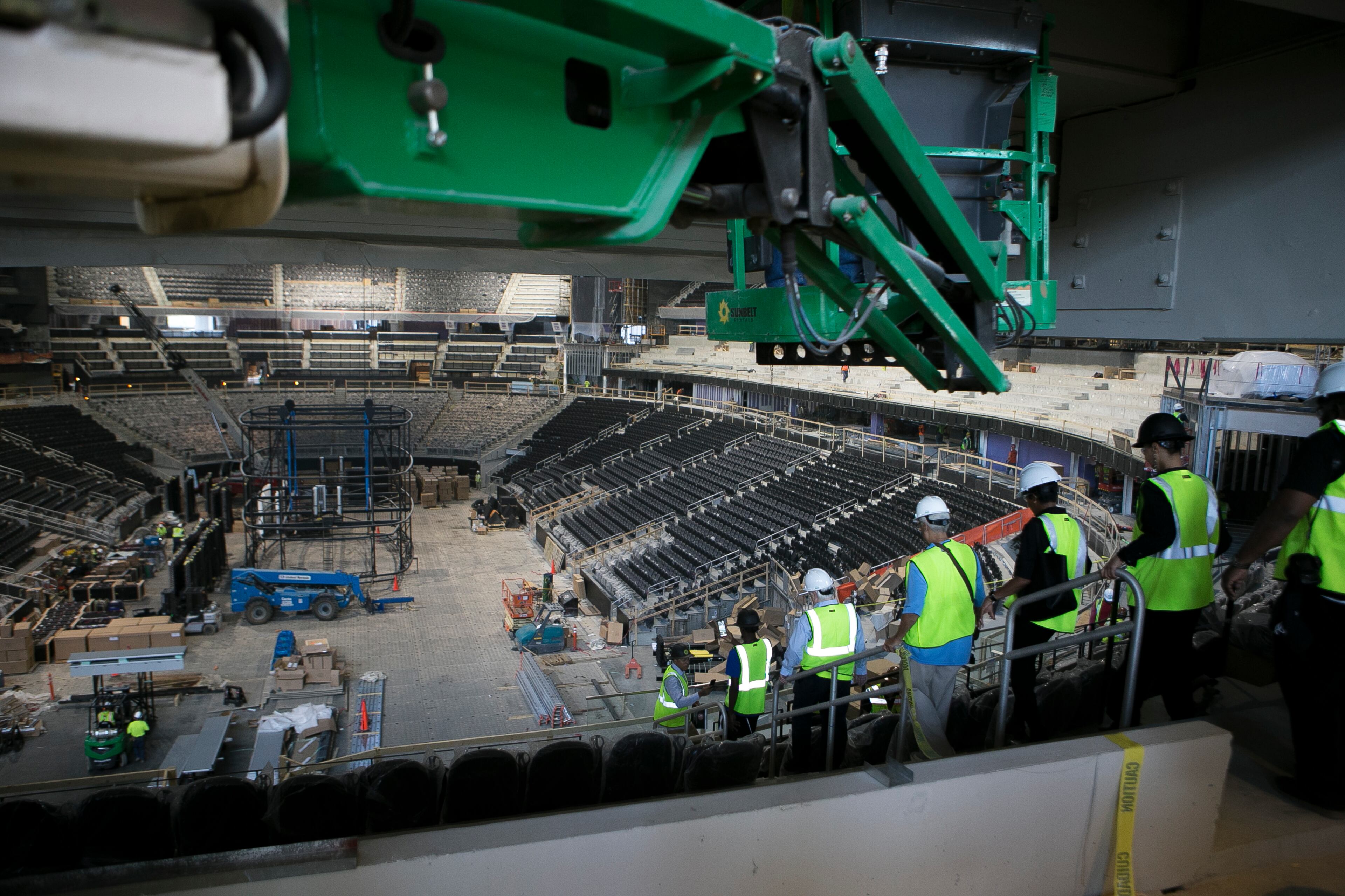 Members of the media make their way down the stairs of the main ballroom during a guided media tour through the in-progress renovations at the State Farm Arena in Atlanta, Ga., on Thurs., Sept. 20, 2018. The renovations, which total $192.5 million, are on track to be completed by the arena's scheduled open house on October 20. The current rate of progress is about $1 million of work per day, according to Brett Stefansson, Atlanta Hawks executive vice president and general manager of State Farm Arena. (CASEY SYKES, CASEYLANESYKES@GMAIL.COM)