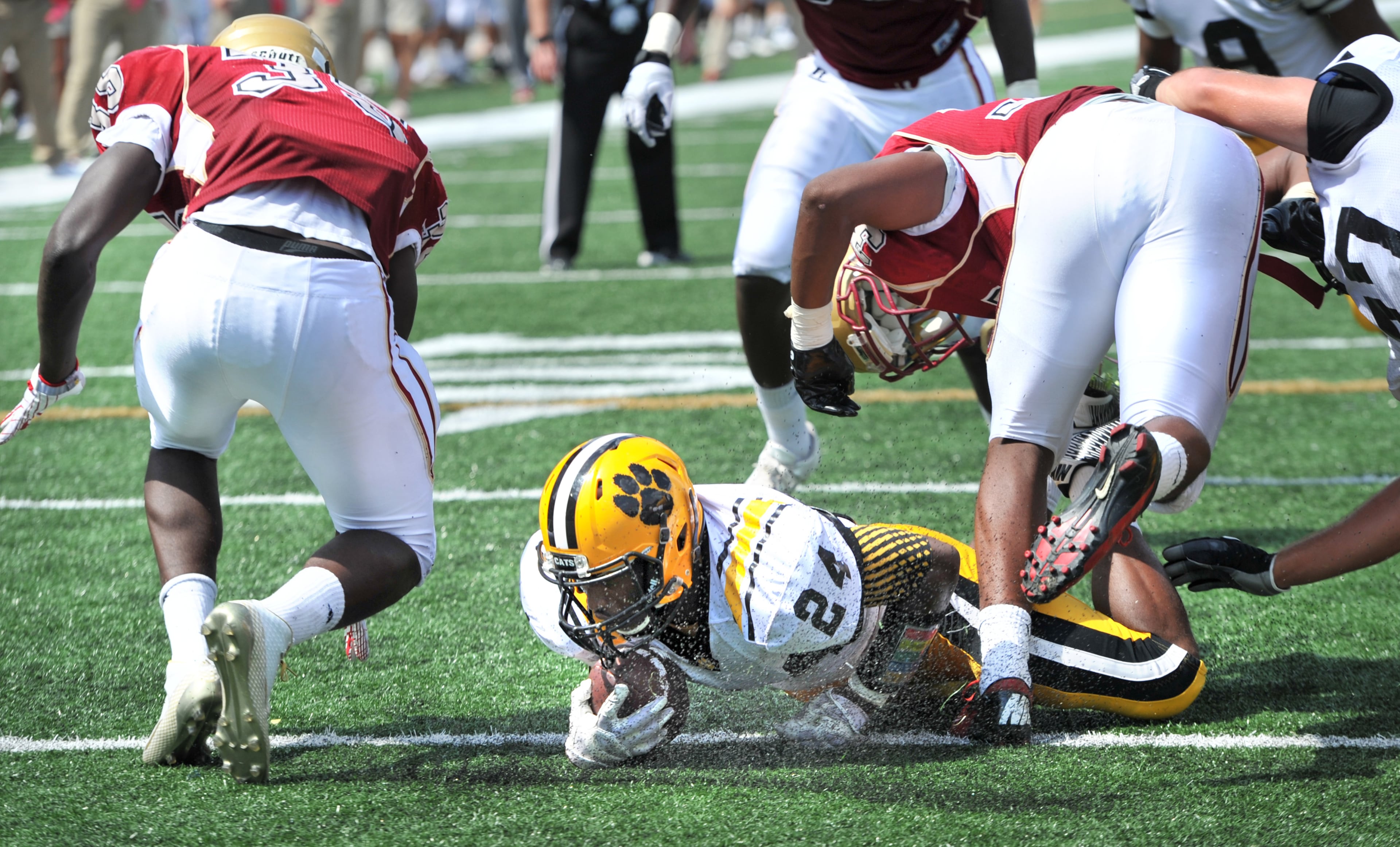Valdosta's Tim Griffin (24) dives for a touchdown against the Brookwood in the first half of the 2014 Corky Kell Classic at McEachern High School in Powder Springs on Saturday, August 23, 2014.