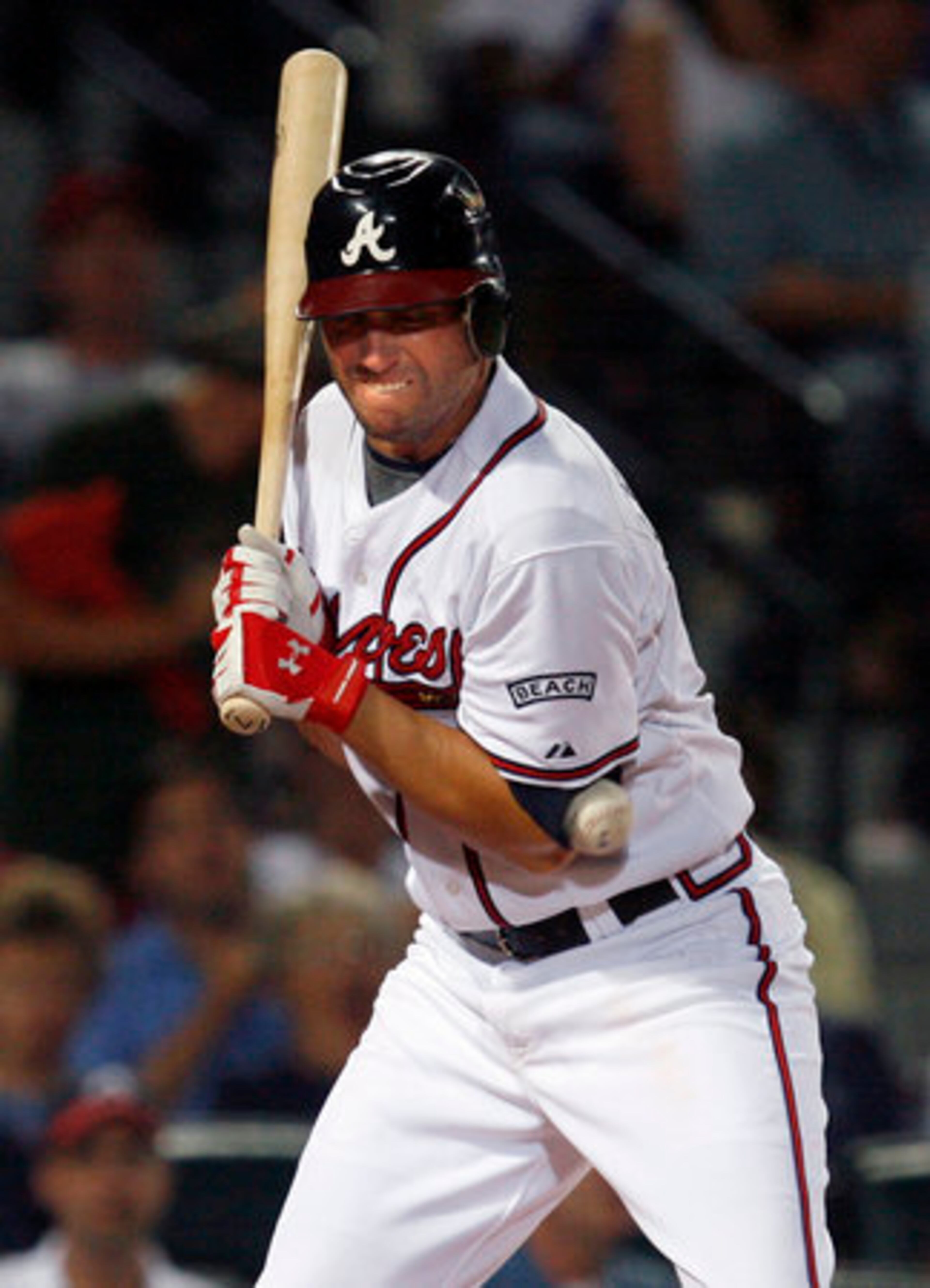 Atlanta Braves' Jeff Francoeur is hit with a ball in the elbow in a June 20 game against the Mariners. This was the start of a long slump for hometown hero Jeff Francoeur. At this point in the season, Francoeur had a batting average of .217 over a stretch of 32 games.