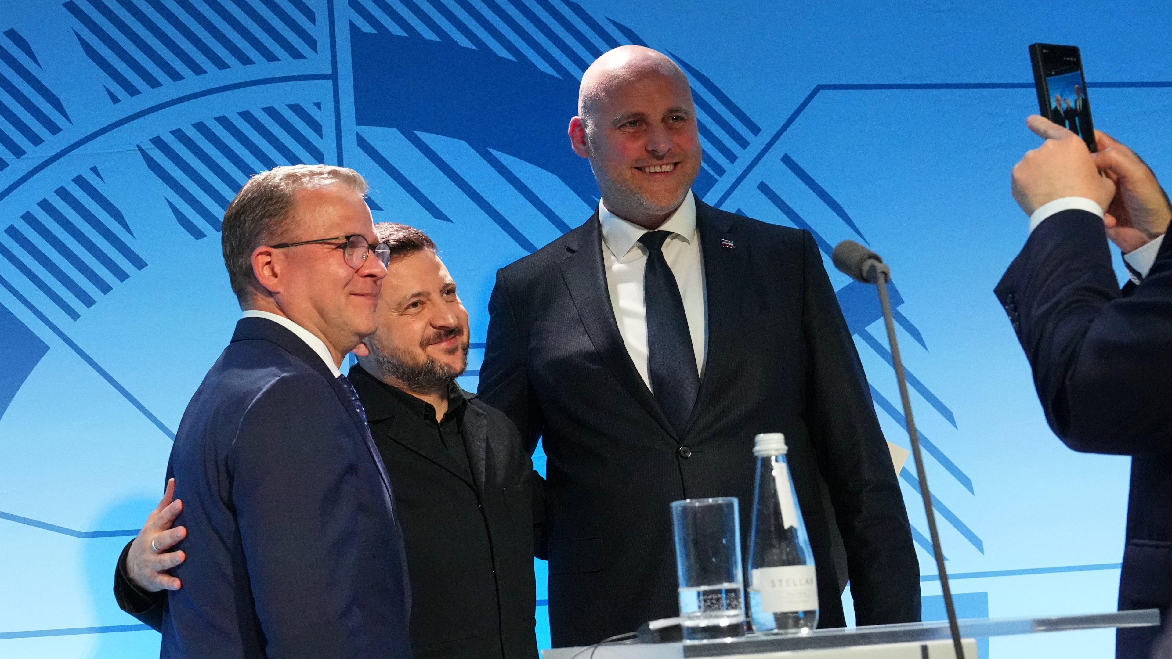 From left, Finnish Prime Minister Petteri Orpo, Ukraine's President Volodymyr Zelenskyy and Latvia's Prime Minister Andris Kulbergs pose for photo after a news conference at the Nordic and Baltic countries meeting in Tallinn, Estonia, Tuesday, June 9, 2026. (AP Photo/Sergei Grits)