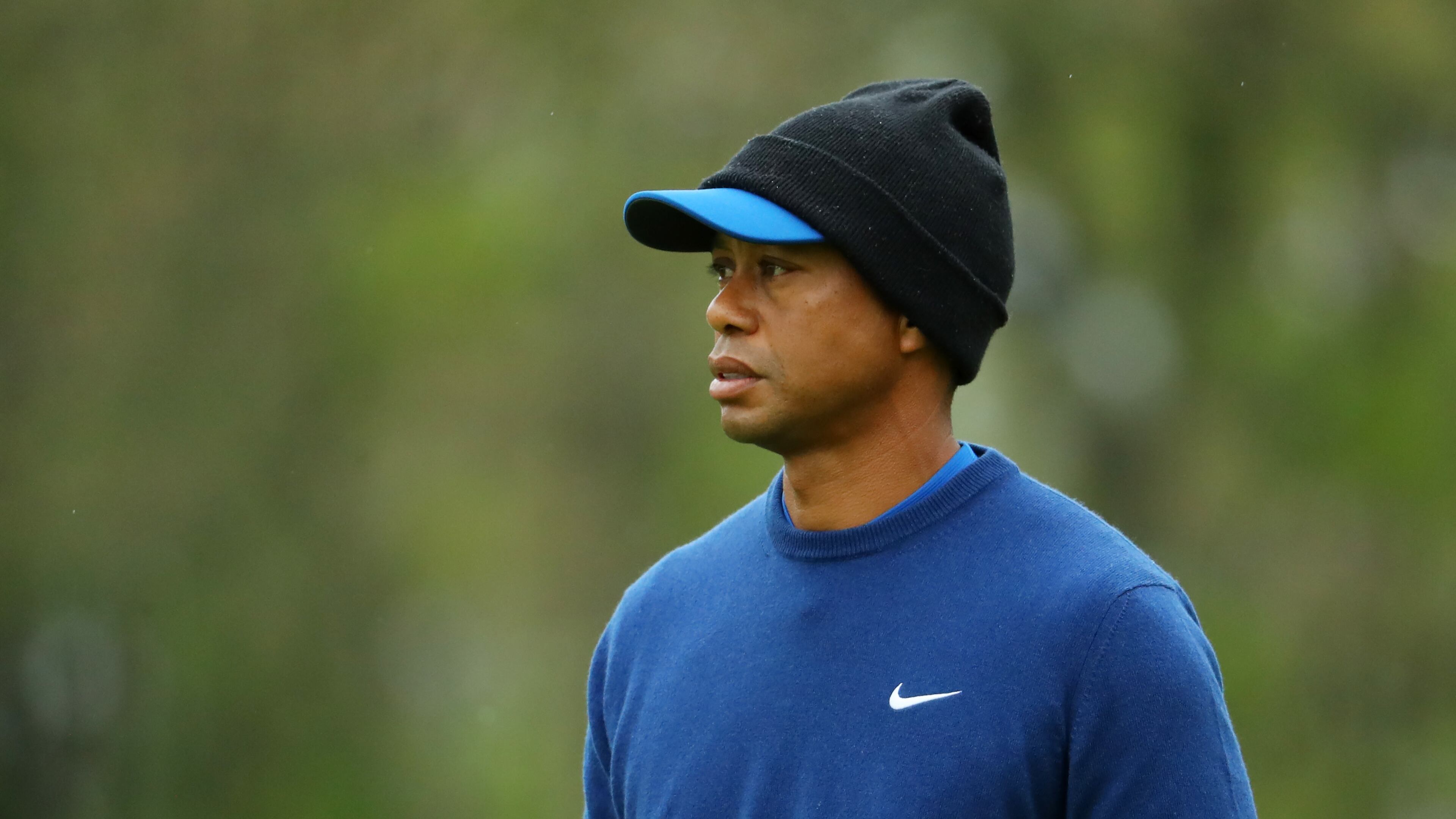 A PGA Championship in May in New York can be a chilly proposition - note Tiger Woods during an early-week practice round. But it's expected to heat up once the real competition begins. (Photo by Warren Little/Getty Images)
