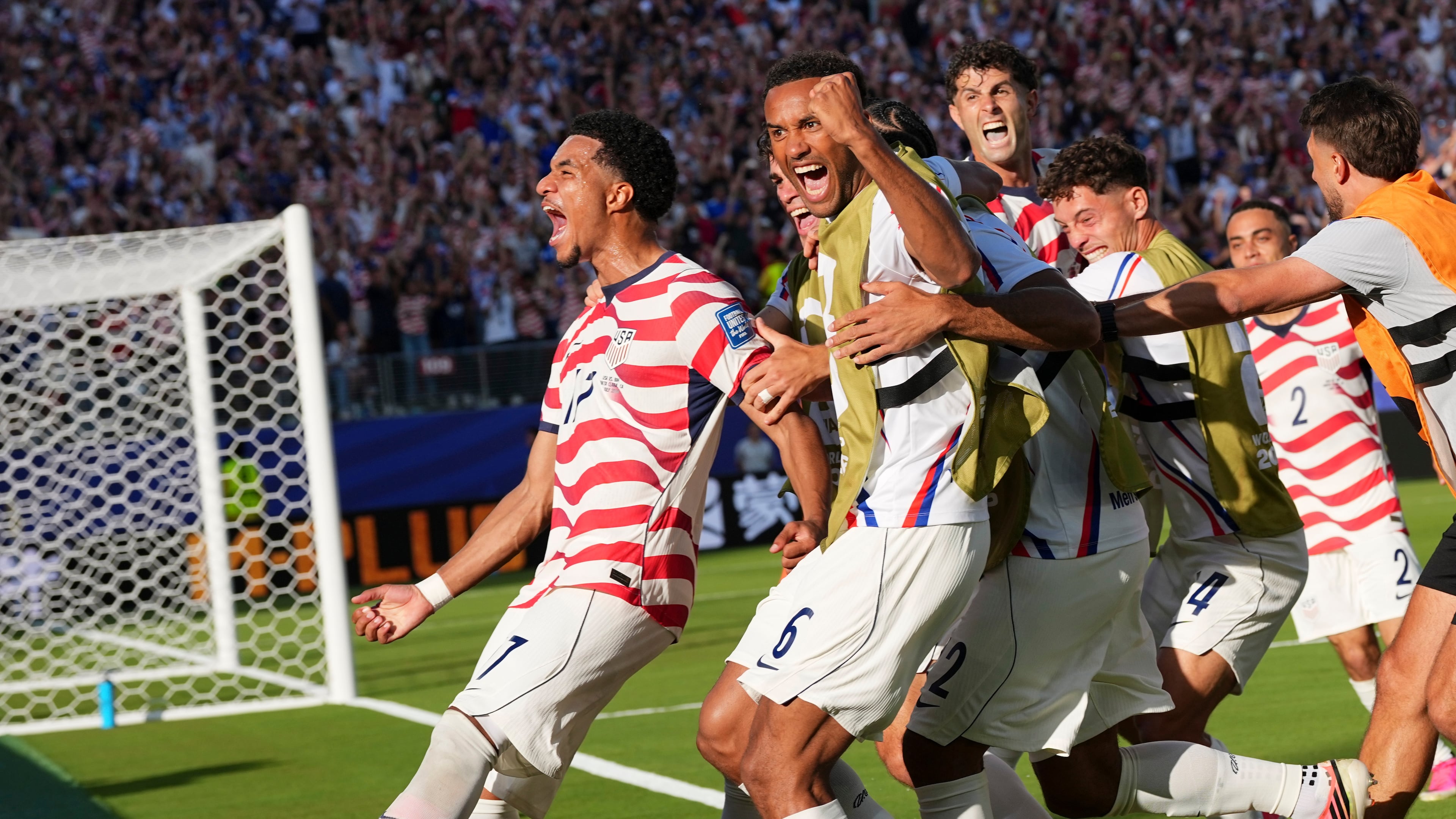United States' Malik Tillman (17) celebrates with teammates after scoring on a free kick during the World Cup round of 32 soccer match between the United States and Bosnia in Santa Clara, Calif., near San Francisco, Wednesday, July 1, 2026. (AP Photo/Martin Meissner)