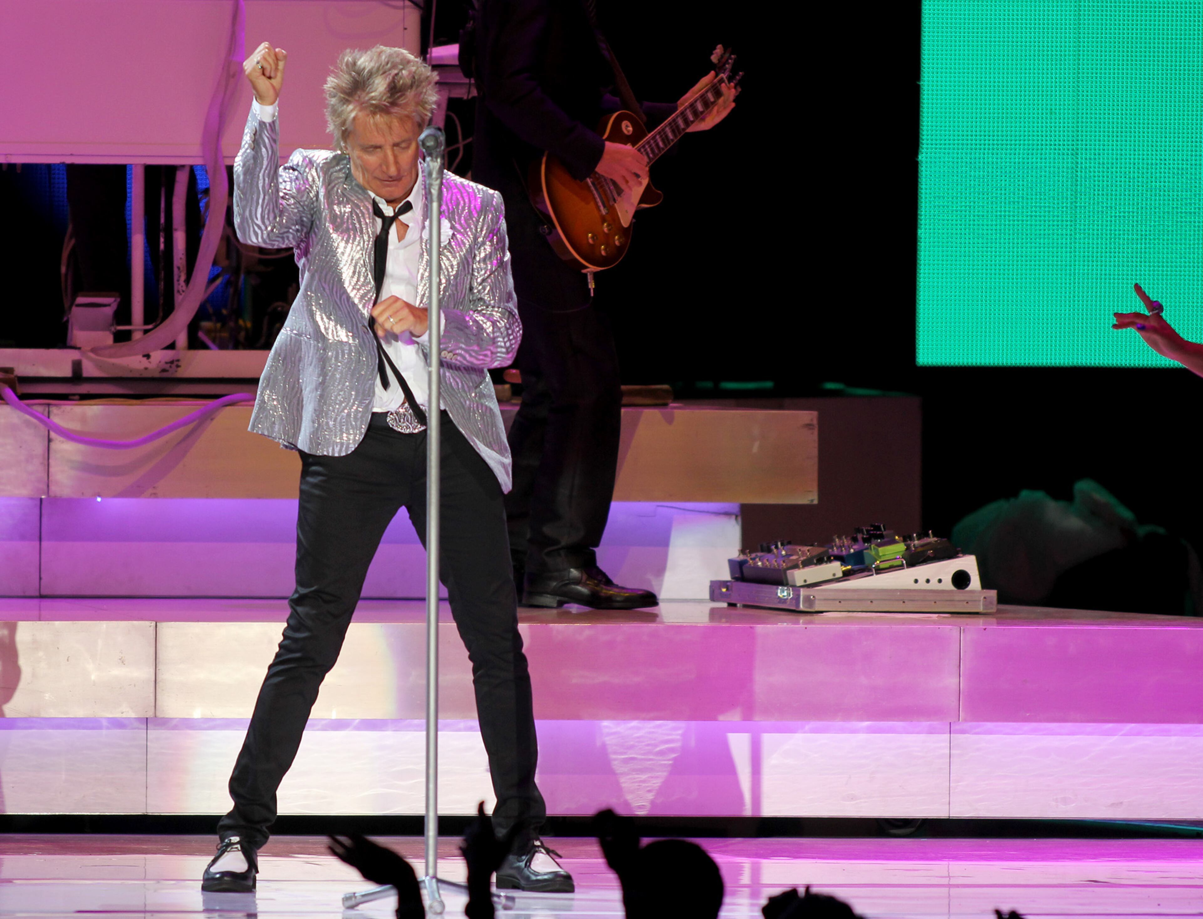 Rod Stewart performs Wednesday, July 15, 2015 at the Verizon Wireless Amphitheatre at Encore Park in Alpharetta. (Akili-Casundria Ramsess/Special to the AJC)