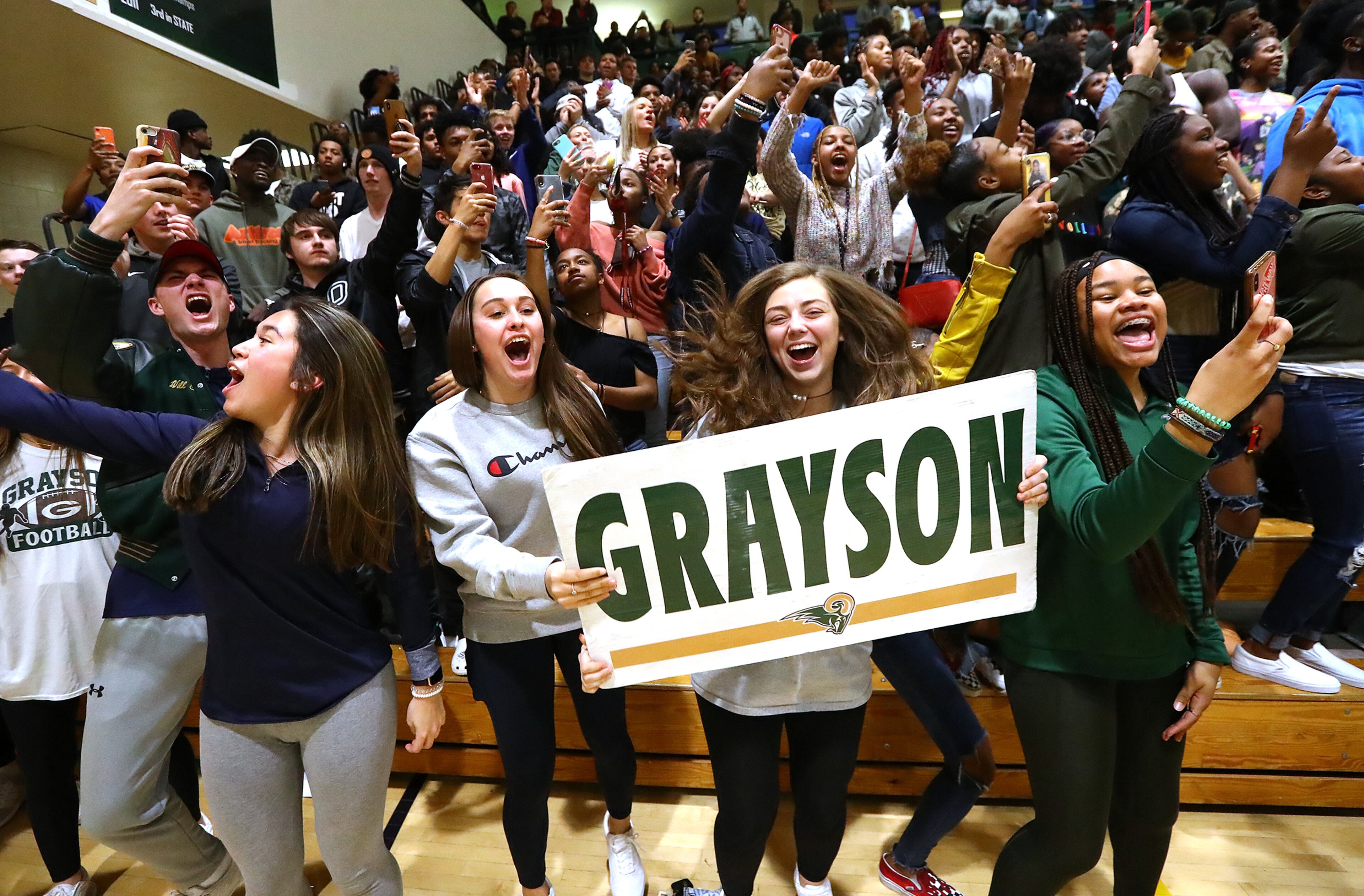 Grayson fans cheer their team against Norcross in their Class AAAAAAA quarterfinal game at Grayson High School on Wednesday, Feb. 26, 2020, in Loganville. Curtis Compton ccompton@ajc.com