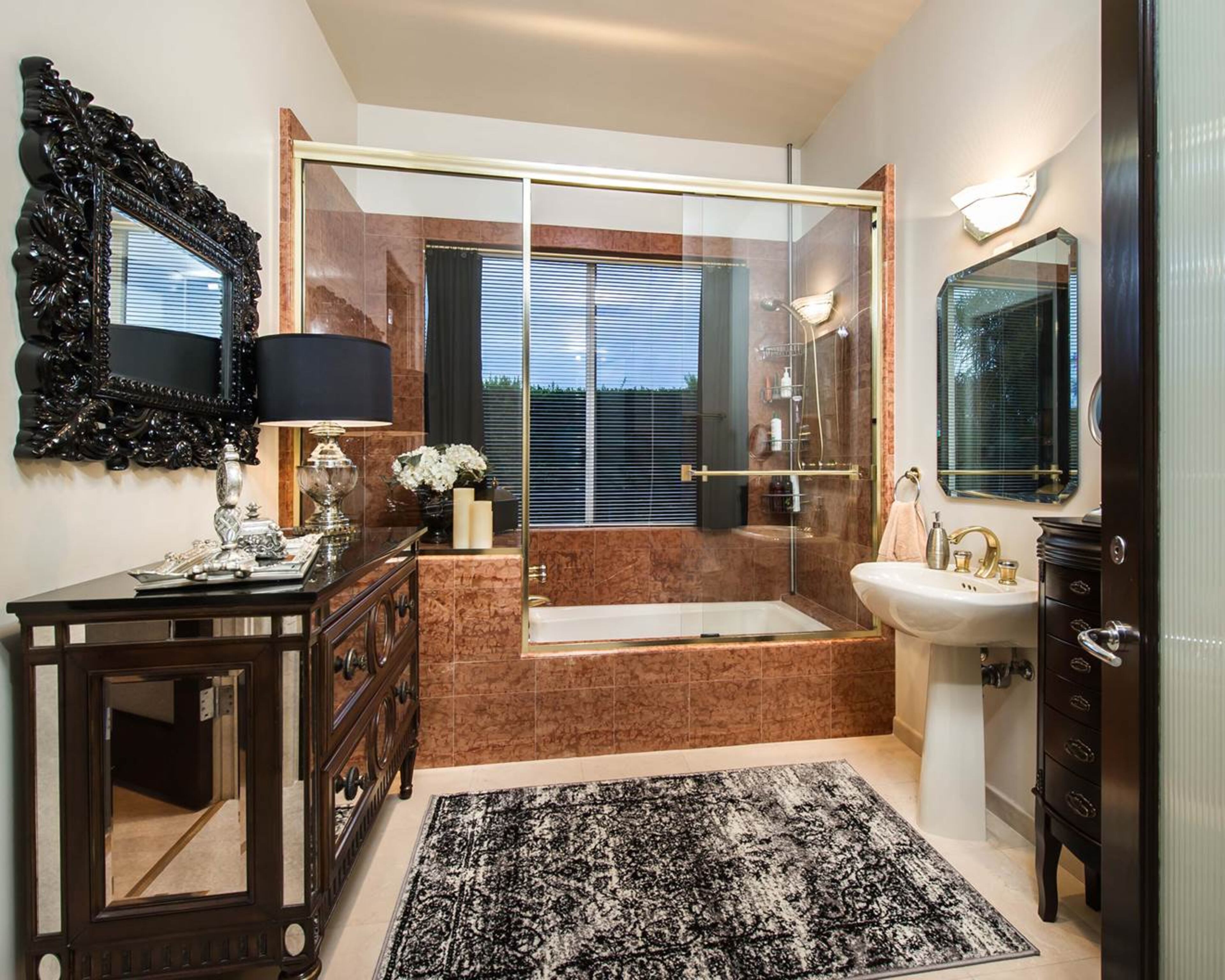 Dexter King has put his 4-bedroom, 6-bath Malibu mansion up for sale with an asking price of $4,850,000. The 6,823 square-foot home sits on a property that's over and acre, and includes 15 fruit trees. The main house includes a chef's kitchen, formal dining area, theatre, elevator, home office and full gym. Outdoor features include a cabana, koi pond, waterfall spa and bbq. (Marc Angeles)