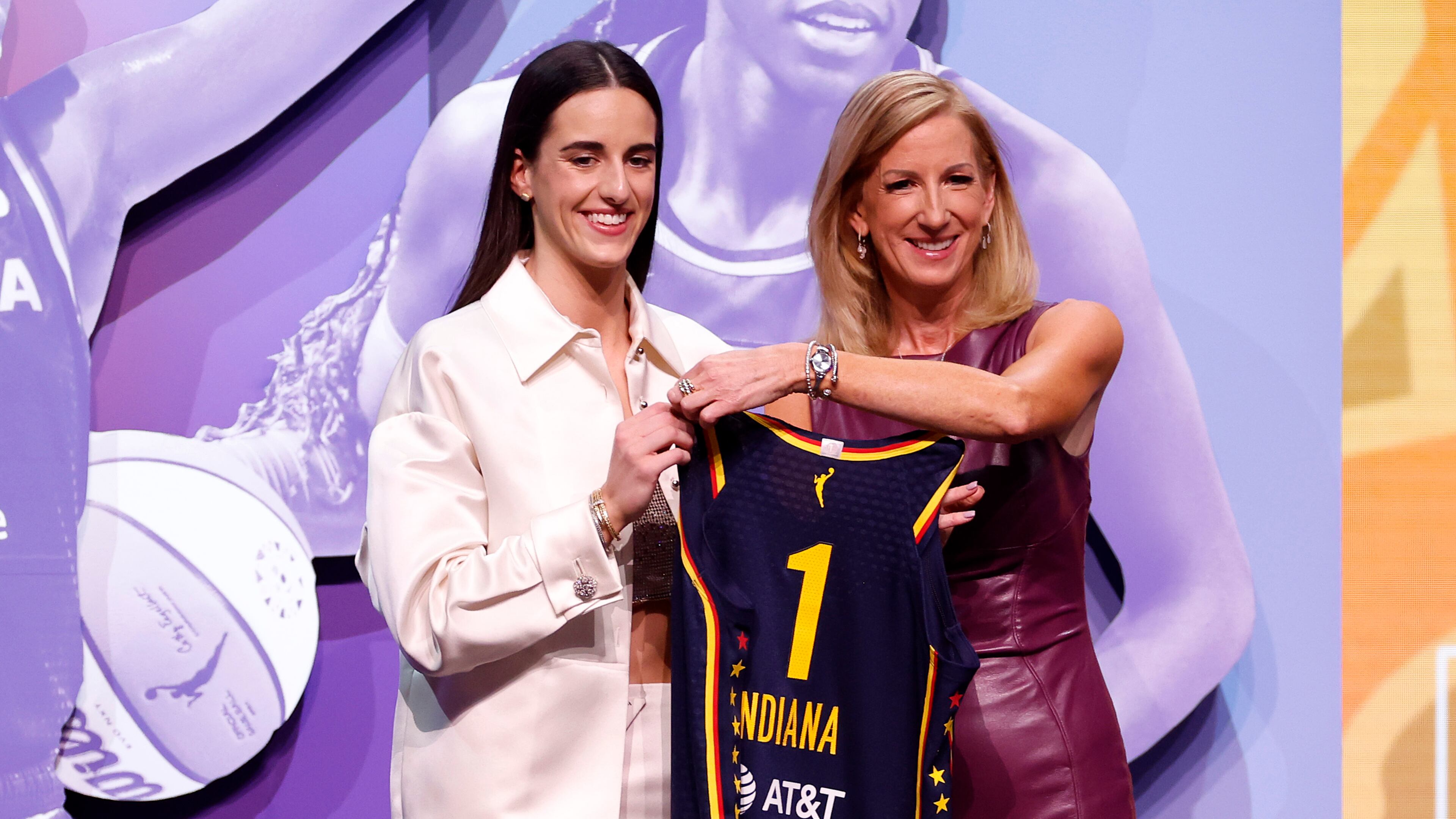 Caitlin Clark (left) poses with WNBA Commissioner Cathy Engelbert after being selected as the first overall pick by the Indiana Fever during the 2024 WNBA draft at Brooklyn Academy of Music on Monday, April 15, 2024, in New York City. (Sarah Stier/Getty Images/TNS)