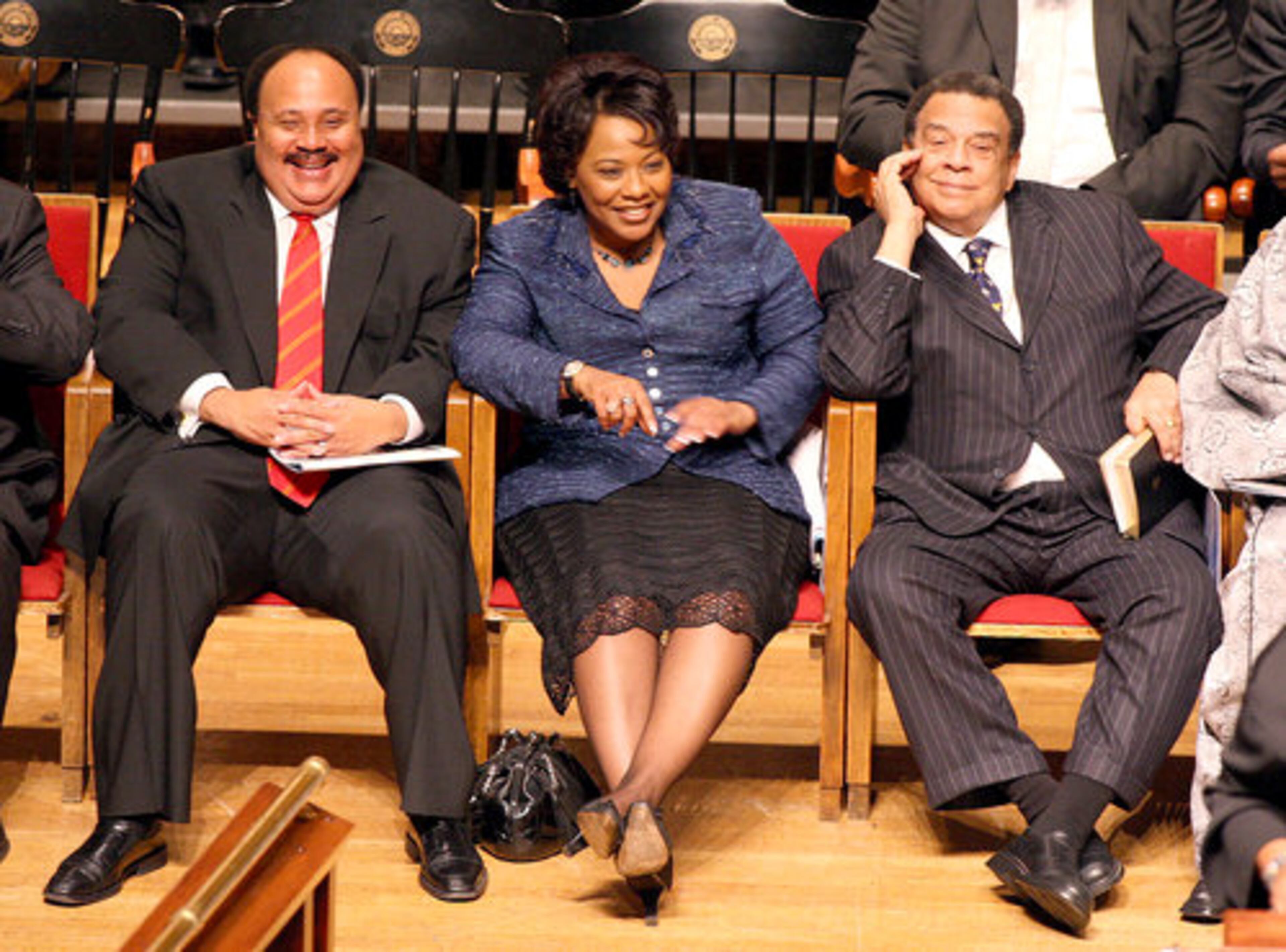 Martin Luther King lll , Elder Bernice King and Former Atlanta Mayor Andrew Young smile and laugh after Elizabeth Omilami joked with Young.