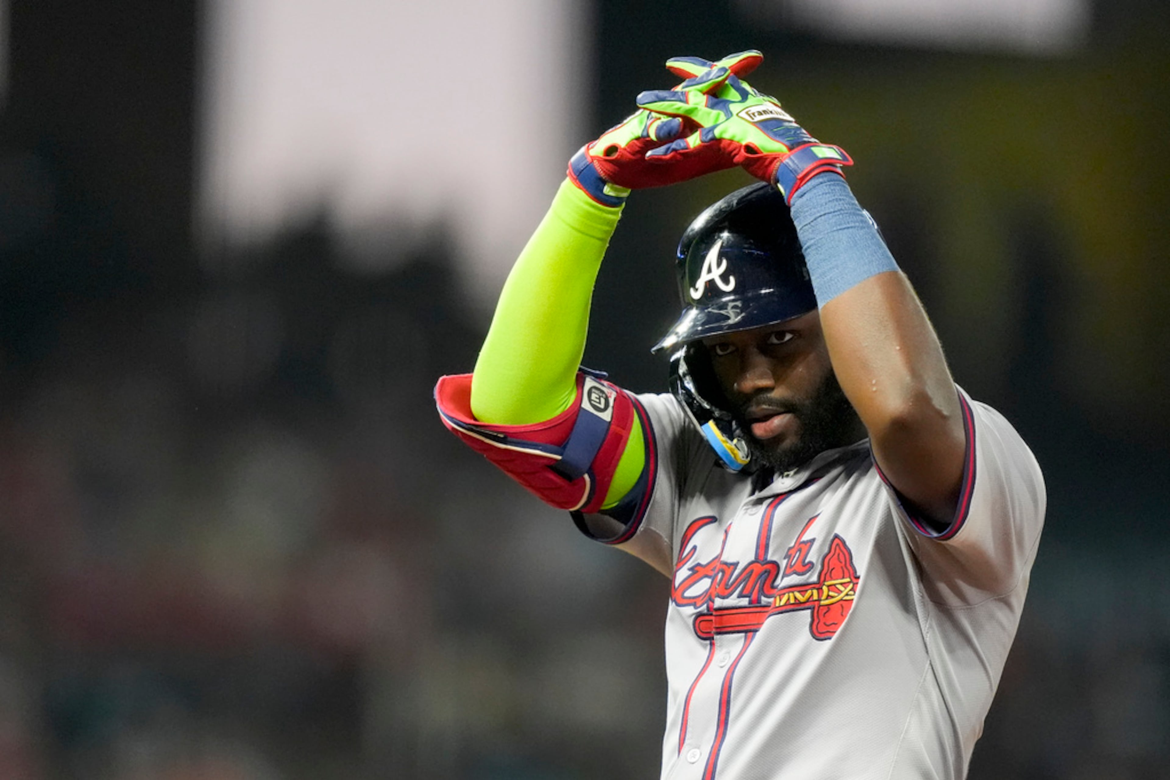 Atlanta Braves' Michael Harris II celebrates after hitting a single during the fifth inning of a baseball game against the Los Angeles Angels, Saturday, Aug. 17, 2024, in Anaheim, Calif. (AP Photo/Ryan Sun)