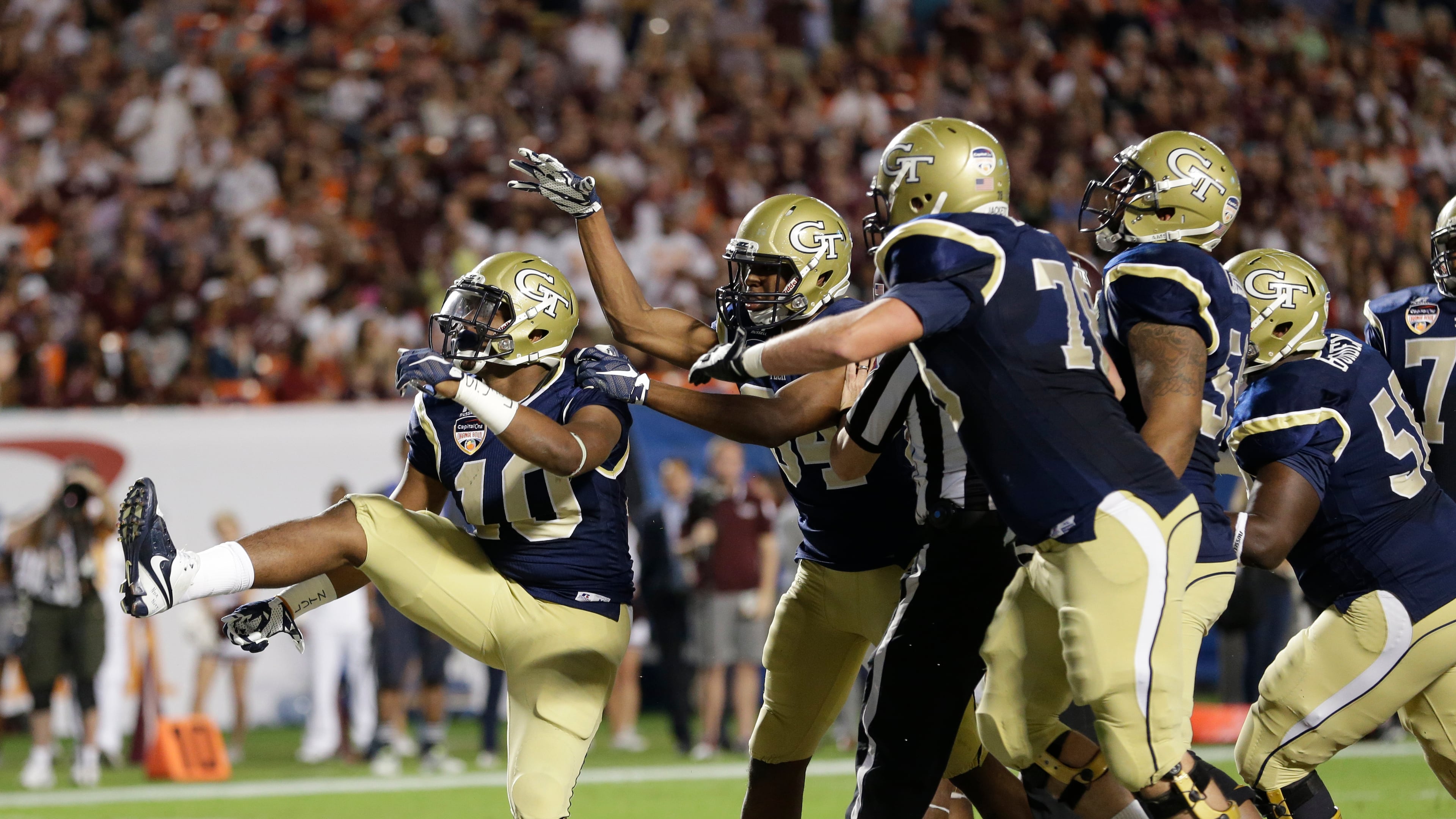 Georgia Tech running back Synjyn Days (10) celebrates with offensive lineman Trey Braun (78) after scoring a touchdown in the first half of the Orange Bowl NCAA college football game against Mississippi State, Wednesday, Dec. 31, 2014, in Miami Gardens, Fla. (AP Photo/Wilfredo Lee) A spot in the Medal of Honor Bowl will give former Tech running back Synjyn Days the opportunity to showcase his ability before NFL scouts. (ASSOCIATED PRESS)