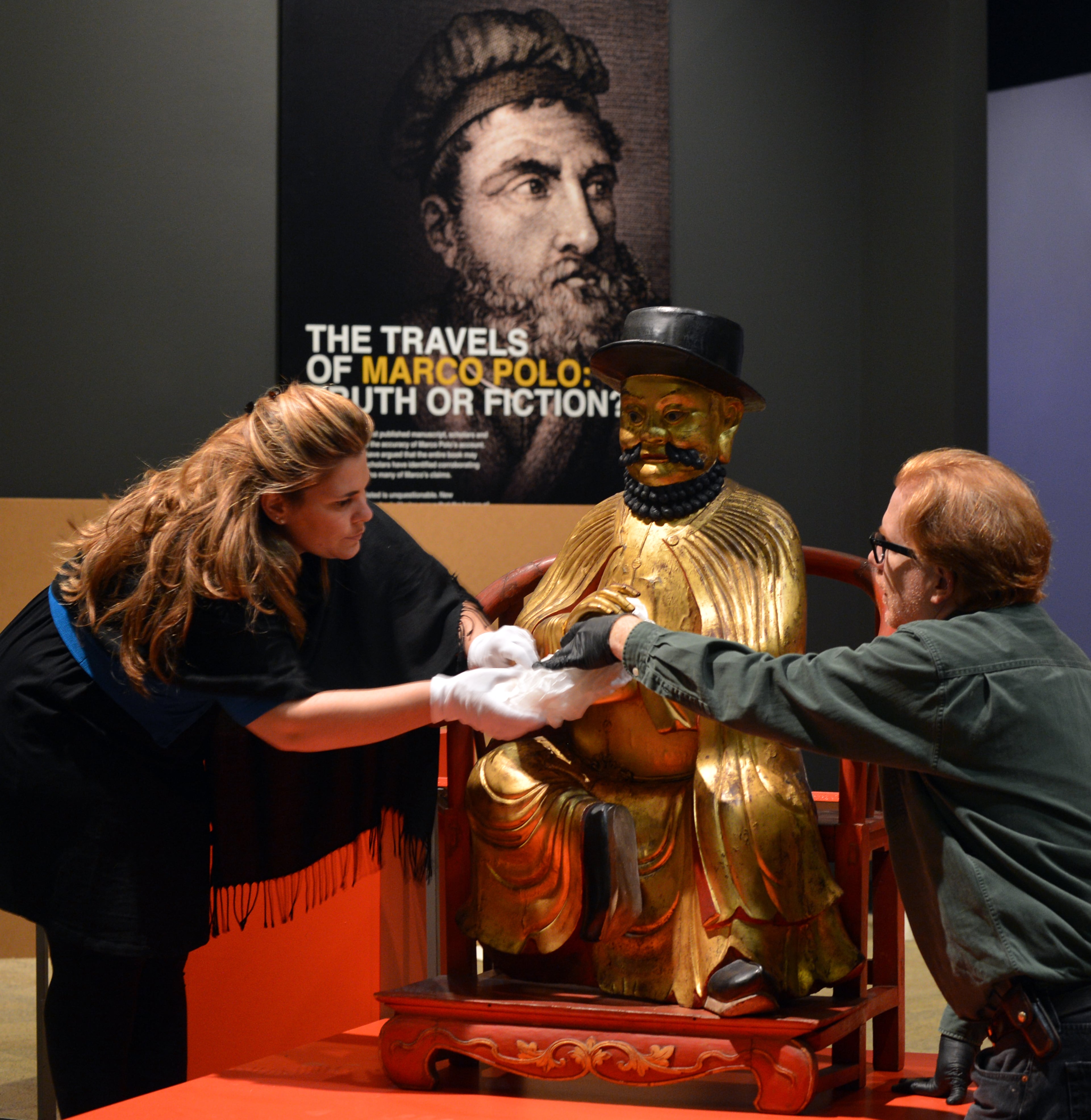 September 23, 2013 Atlanta: Marco Polo effigy statue is installed by Linda Carioni and Will-Grewe Mullins, at the Fernbank Museumof Natural History Monday September 23, 2013 . The 19th-century statue, produced by and anonymous Chinese sculptor, is the orientalized portrait of Marco Polo. BRANT SANDERLIN /BSANDERLIN@AJC.COM
