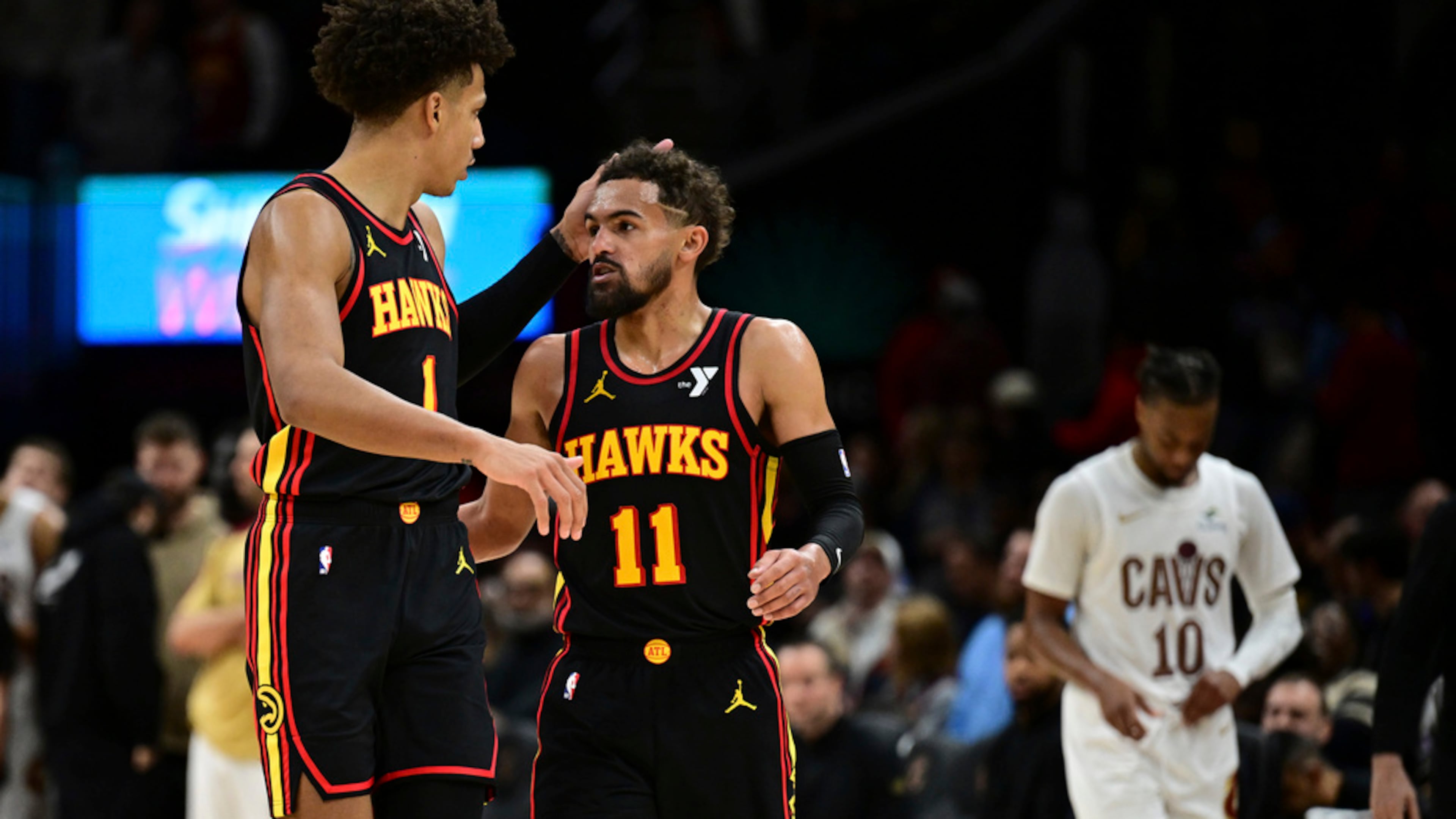 ESPN ranks Atlanta Hawks guard Trae Young (right) 29th in the NBA, and teammate Jalen Johnson 44th. (David Dermer/AP)