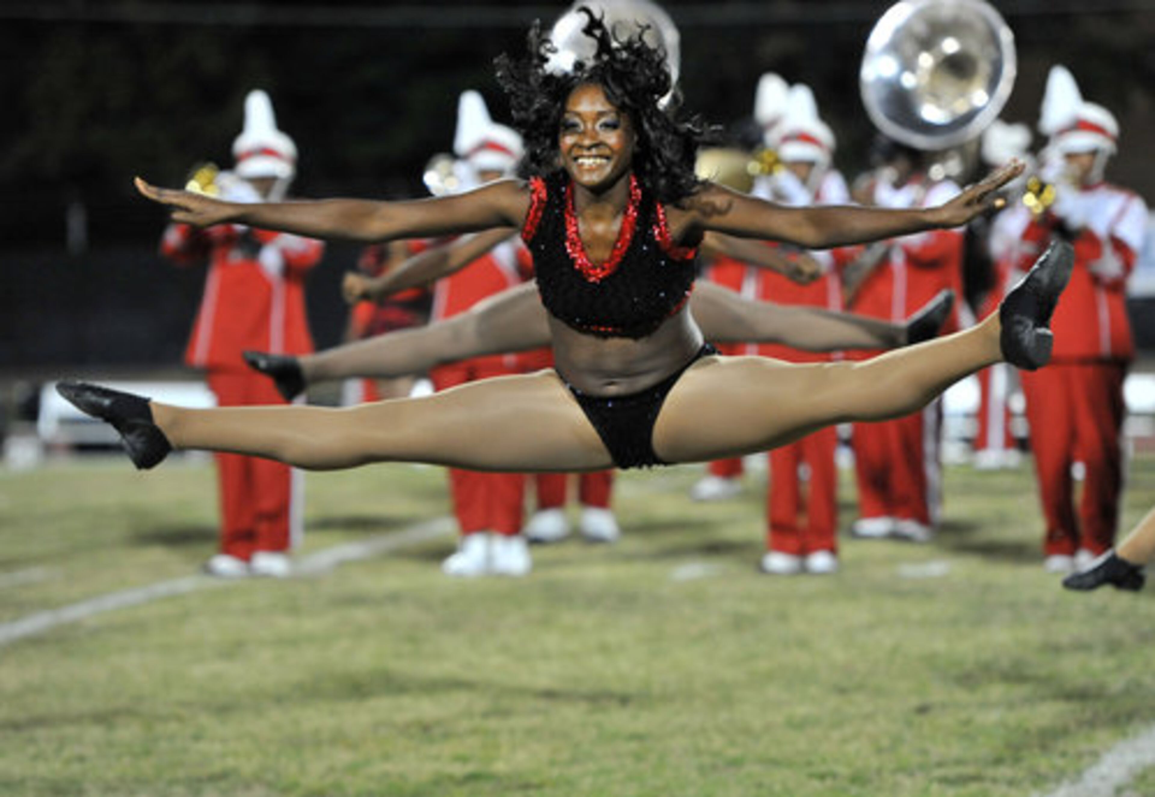 Clark Atlanta marching band members perform during the half time show of the game against the Morehouse at B.T. Harvey Stadium in Morehouse College on Thursday, September 29, 2011.