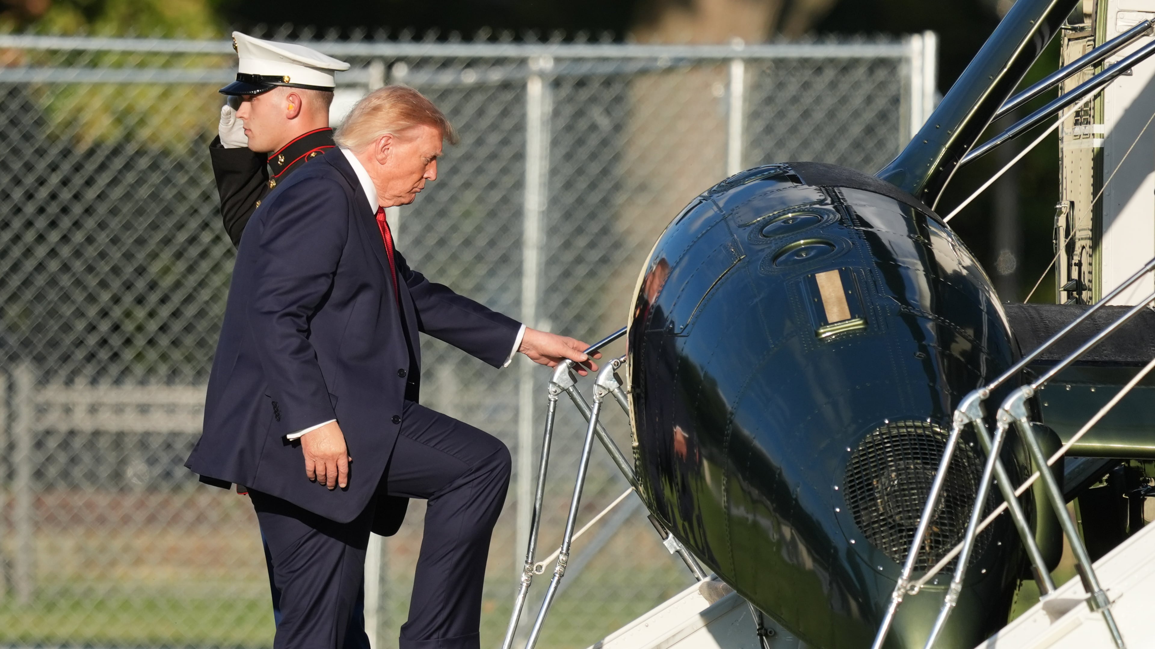 President Donald Trump boards Marine One on the Ellipse near the White House, Friday, Sept. 18, 2026, in Washington. (AP Photo/Alex Brandon)