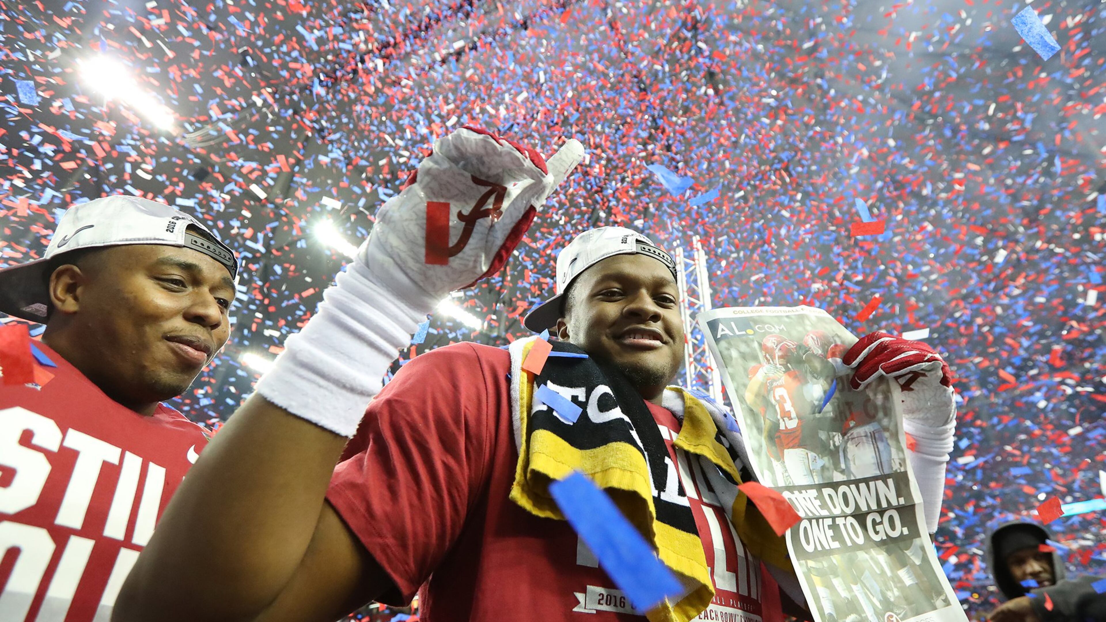 Alabama players celebrate their 24-7 victory over Washington in the Chick-fil-A Peach Bowl at the Georgia Dome. (Curtis Compton/ccompton@ajc.com)