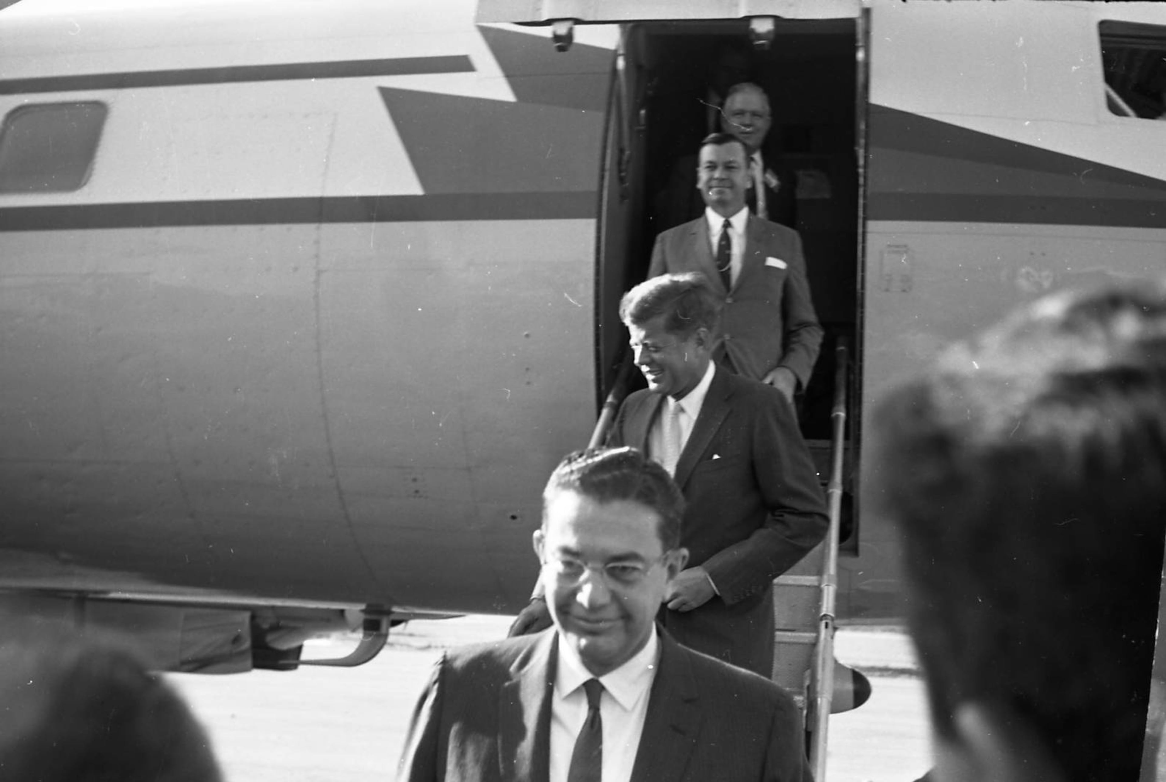 Senator John F. Kennedy and his staff arrive at the LaGrange-Callaway Airport during his presidential campaign, LaGrange, Georgia.