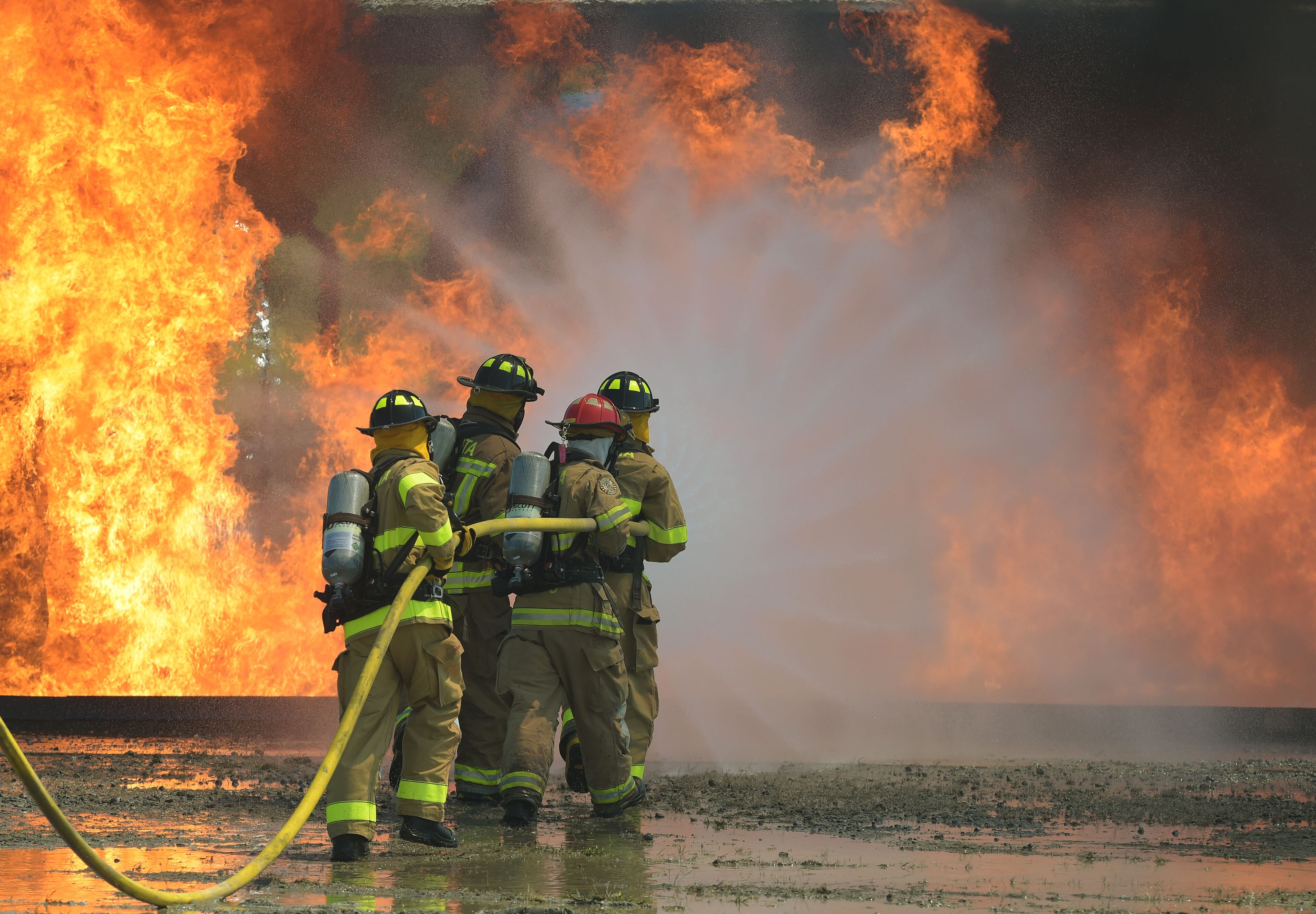 SEPTEMBER 14, 2015 ATLANTA Atlanta Fire Rescue Department firefighters hosted live fire training for attendees at the Aircraft Rescue Fire Fighting (ARFF) Conference, Monday, September, 14, 2015. Firefighters from across the world, battled a simulated fire in an engine and landing gear and also a cascade fire with wing and fuel tanks. Firefighters were Atlanta this week for the 26th Annual ARFF Working Group Conference and Educational Symposium. One of the highlights of the conference was the live fire training at the Hartsfield-Jackson firefighter training site. KENT D. JOHNSON/KDJOHNSON@AJC.COM