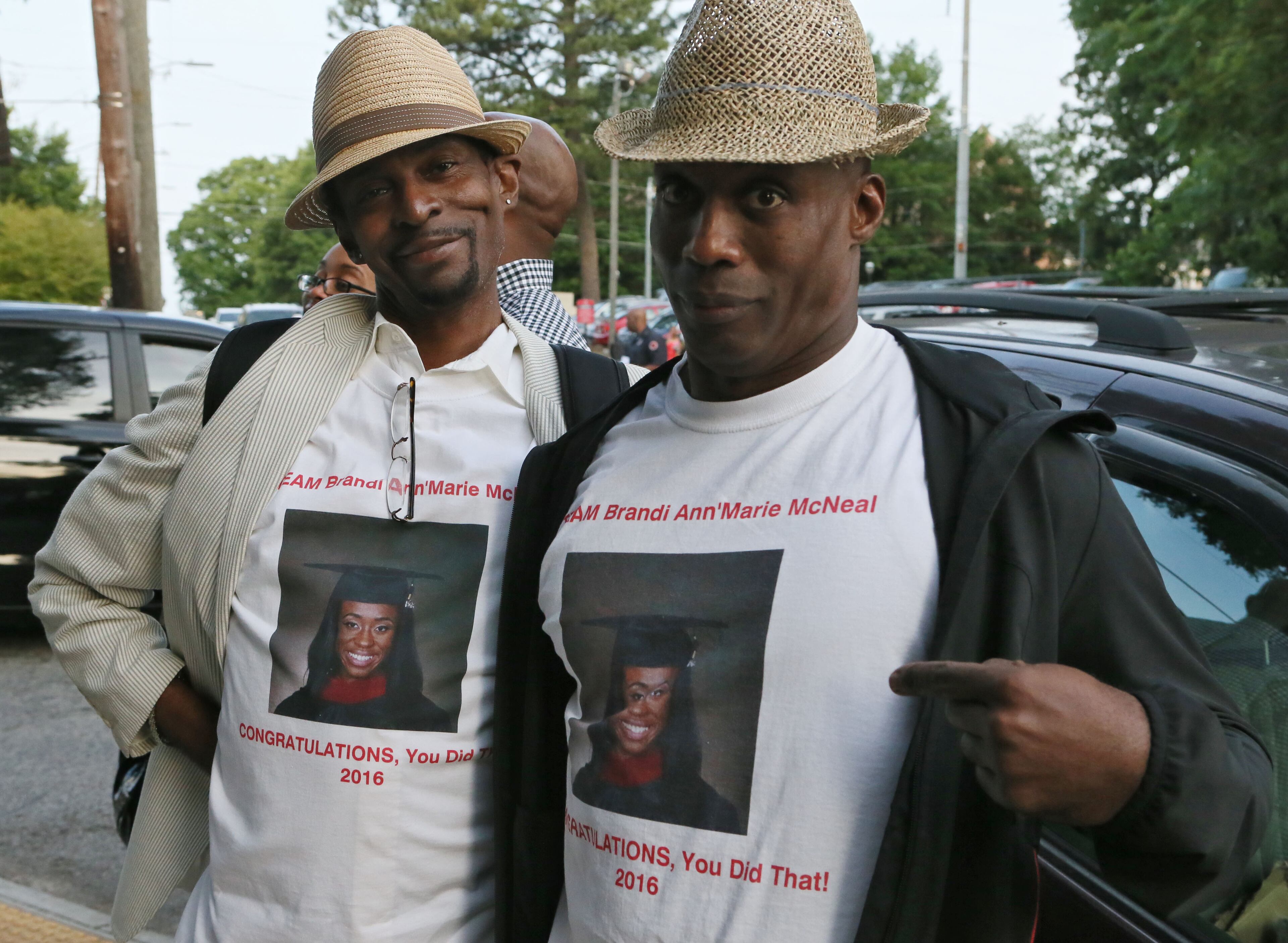 May 16, 2016 - Atlanta - Tyler and Big Pops McNeal show off their t-shirts in honor of Brandi Ann'Marie McNeal's graduation. Clark Atlanta University class of 2016 filled Panther Stadium Monday morning for it's 27th annual Commencement Service. The keynote speaker was retired astronaut Mae Jemison, the first woman of color in Space. Honorary degrees were awarded to Hamilton Bohannon, a 1964 graduate of Clark College; Roland Carter; Congressman John Conyers, and Congressman Hank Johnson, a 1976 Clark College graduate. BOB ANDRES / BANDRES@AJC.COM