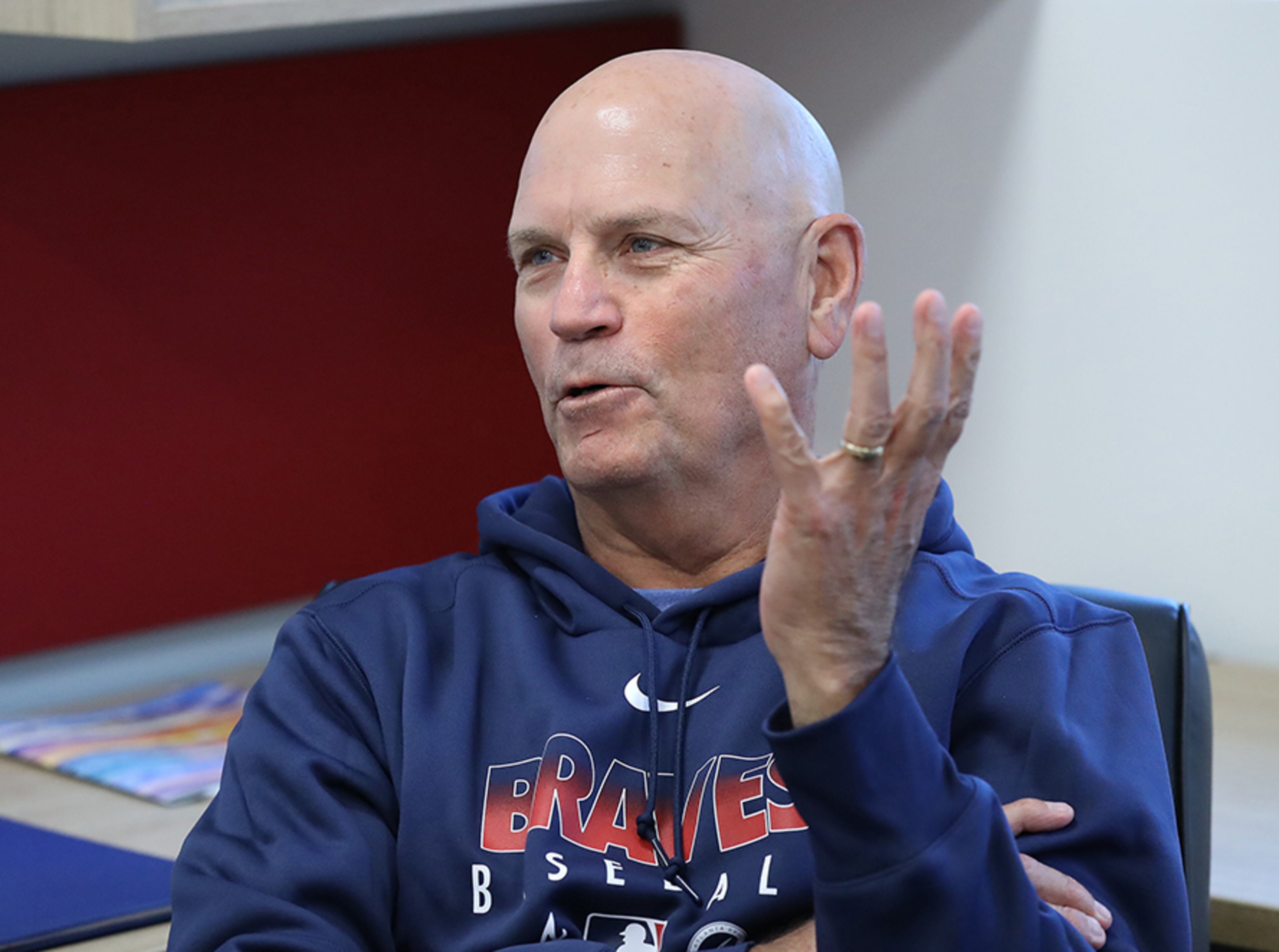 Braves manager Brian Snitker talks to the media in his office on the day pitchers and catchers report to begin spring training Wednesday, Feb. 12, 2020, in North Port, Fla.