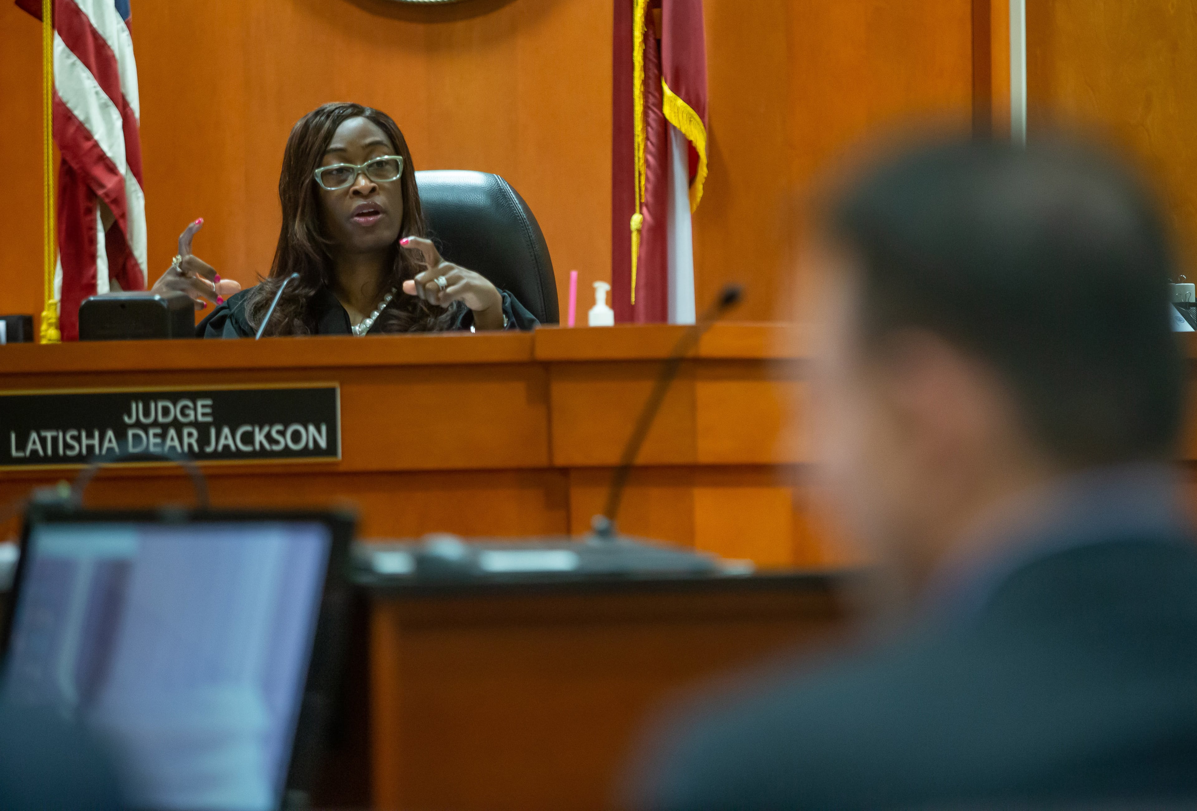 October 4, 2019 -- Judge Latisha Dear Jackson talks with lawyers during the trial of Robert "Chip" Olsen at the DeKalb County Courthouse on October 4, 2019. Olsen is charged with murder in the 2015 fatal shooting of Anthony Hill, a mentally ill war veteran who was naked and unarmed. Olsen was a DeKalb police officer at the time. STEVE SCHAEFER / SPECIAL TO THE AJC
