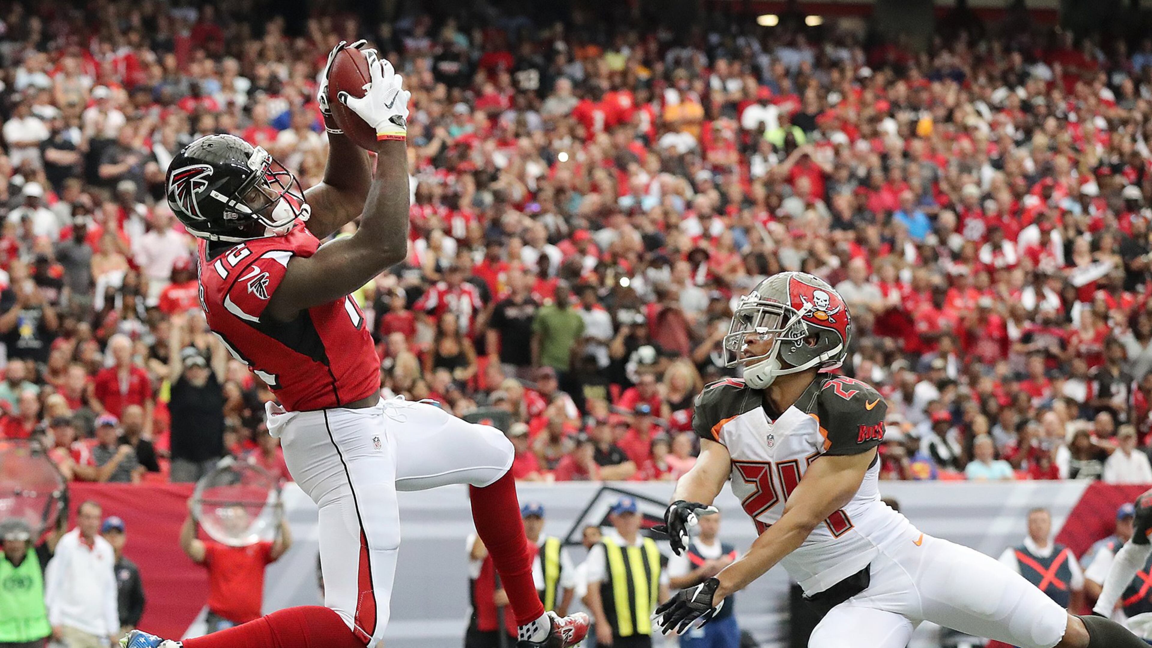 September 11, 2016 ATLANTA: Falcons wide receiver Mohamed Sanu catches a touchdown pass past Buccaneers cornerback Brent Grimes for a 10-3 lead during the first quarter in an NFL football game on Sunday, Sept. 11, 2016, in Atlanta. Curtis Compton /ccompton@ajc.com