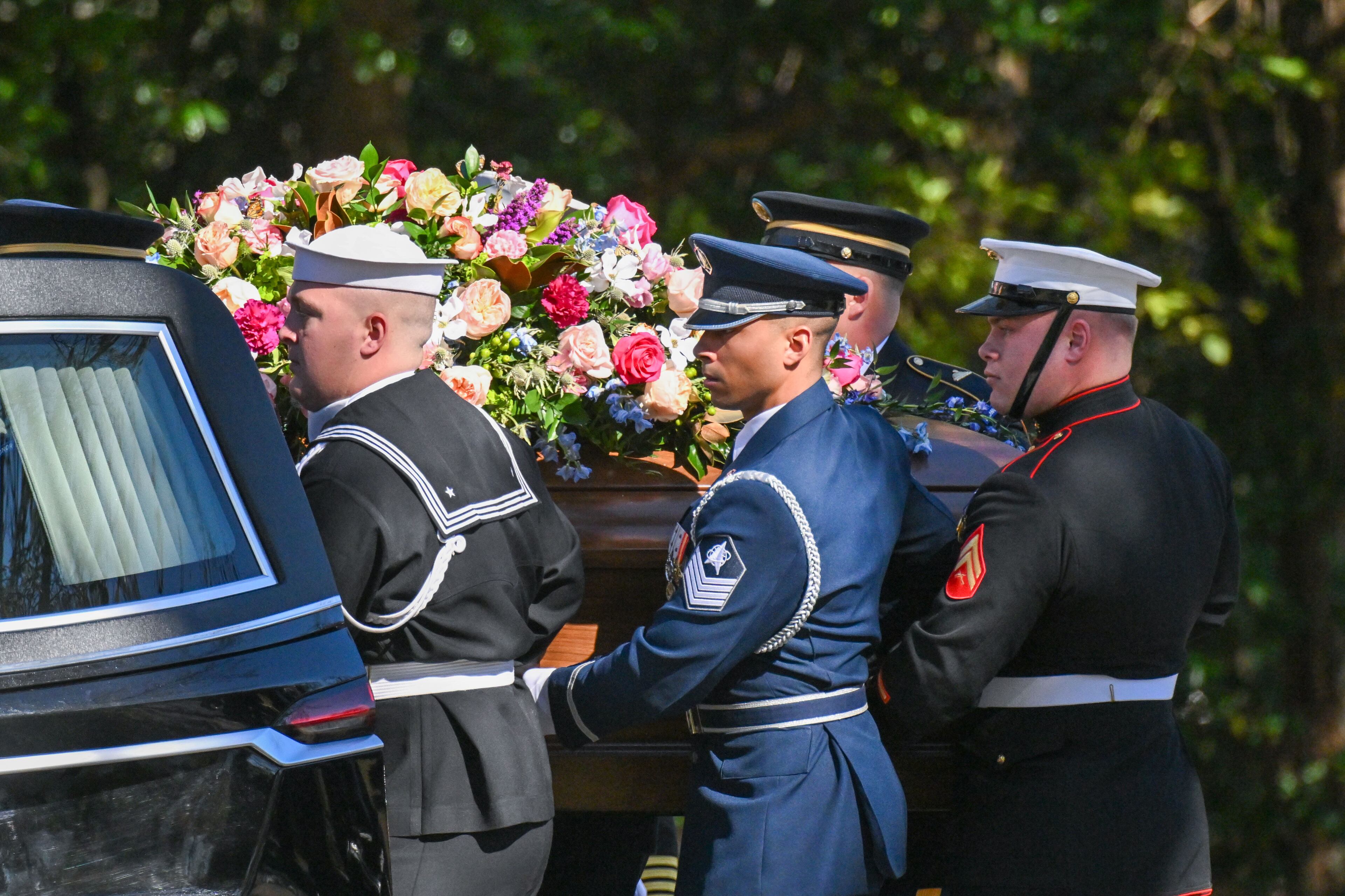 The Armed Forces Body bearer team carries the casket into the hearse for the final procession of the former First Lady Rosalynn Carter as they leave the Maranatha Baptist Church in Plains, GA, for her final goodbye on Wednesday, Nov. 29, 2023. The former first lady died in Plains at age 96. She is survived by her husband, former President Jimmy Carter, their four children, and more than two dozen grandchildren and great-grandchildren.
Miguel Martinez /miguel.martinezjimenez@ajc.com