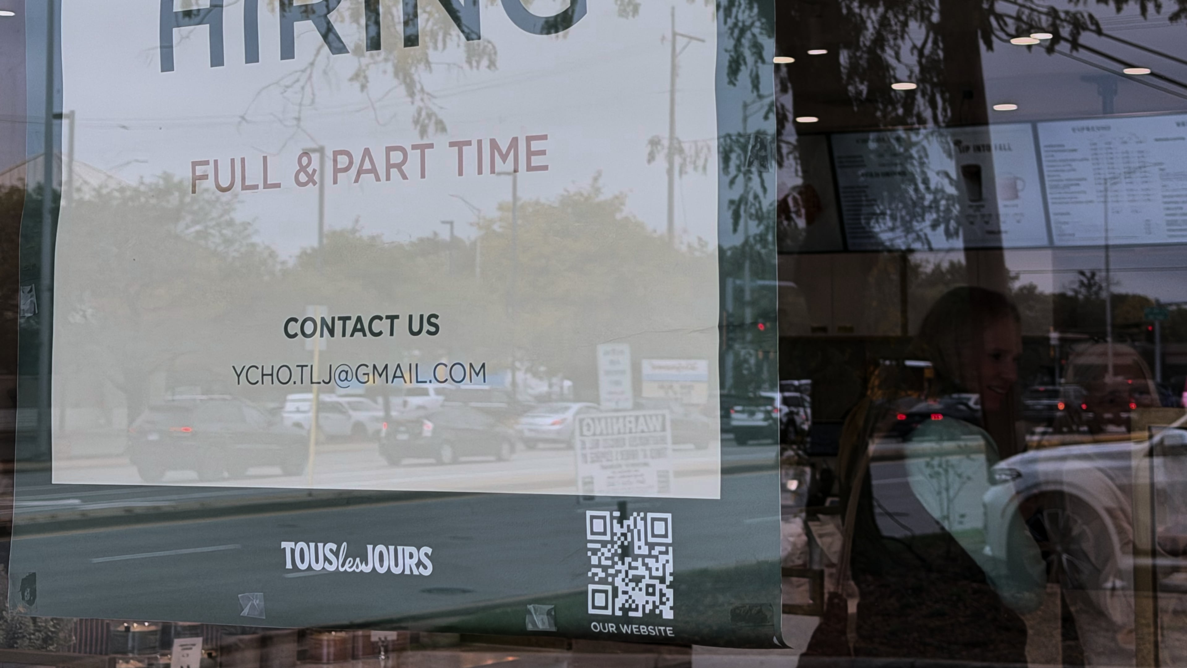Hiring sign is displayed at a bakery in Arlington Heights, Ill., Wednesday, Sept. 30, 2026. (AP Photo/Nam Y. Huh)