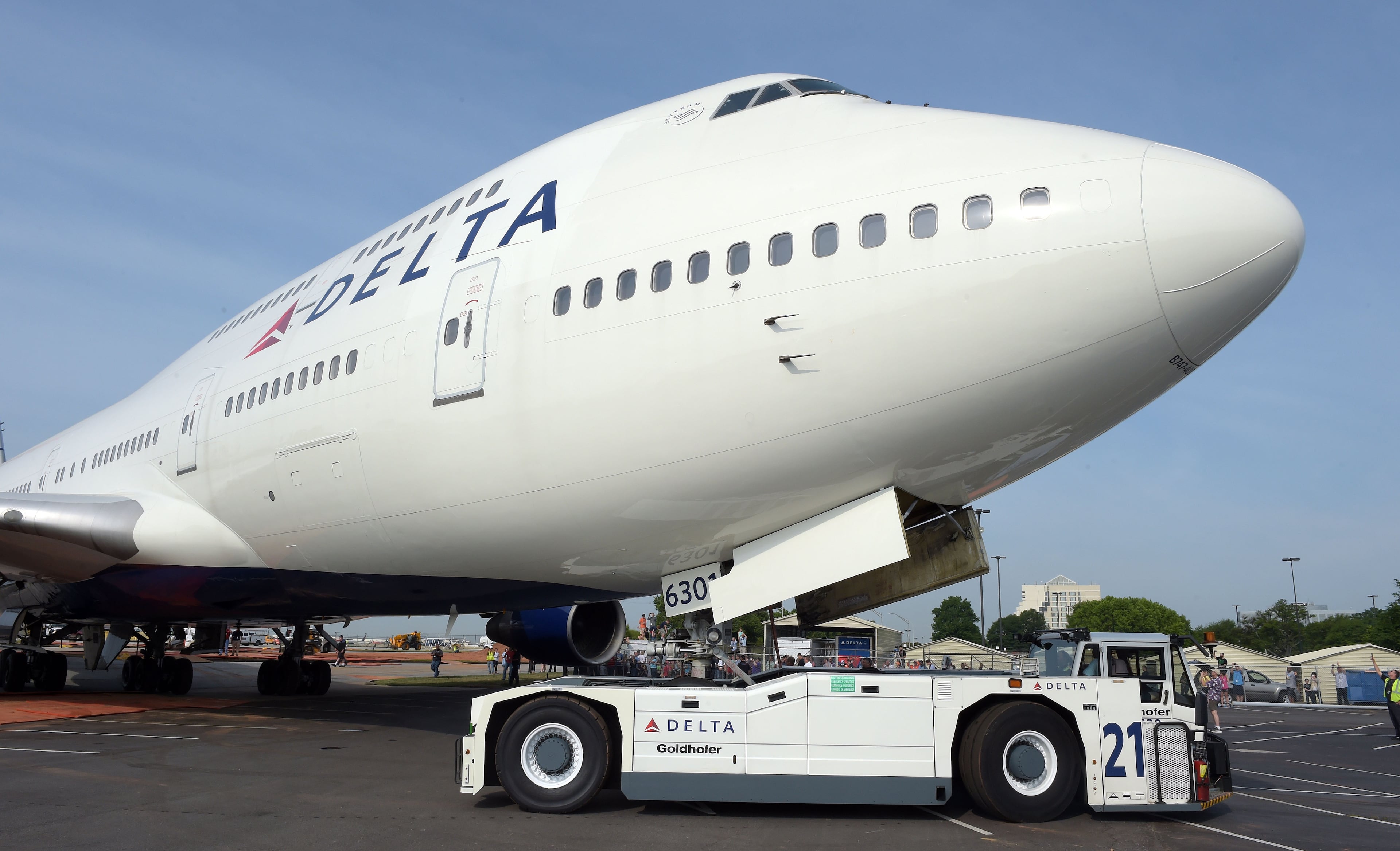 APRIL 30, 2016 ATLANTA Crews move a retired Boeing 747-400 to the Delta Flight museum Saturday, April 30, 2016. Delta Air Lines Ship 6301 made its final journey to Delta’s Atlanta world headquarters campus in preparation for the Delta Flight Museum's latest exhibit featuring the retired aircraft. On September 9, 2015, Delta retired Ship 6301, the first Boeing 747-400 aircraft manufactured for a commercial airline, after its final flight from Honolulu to Atlanta. KENT D. JOHNSON /kdjohnson@ajc.com #delta747experience