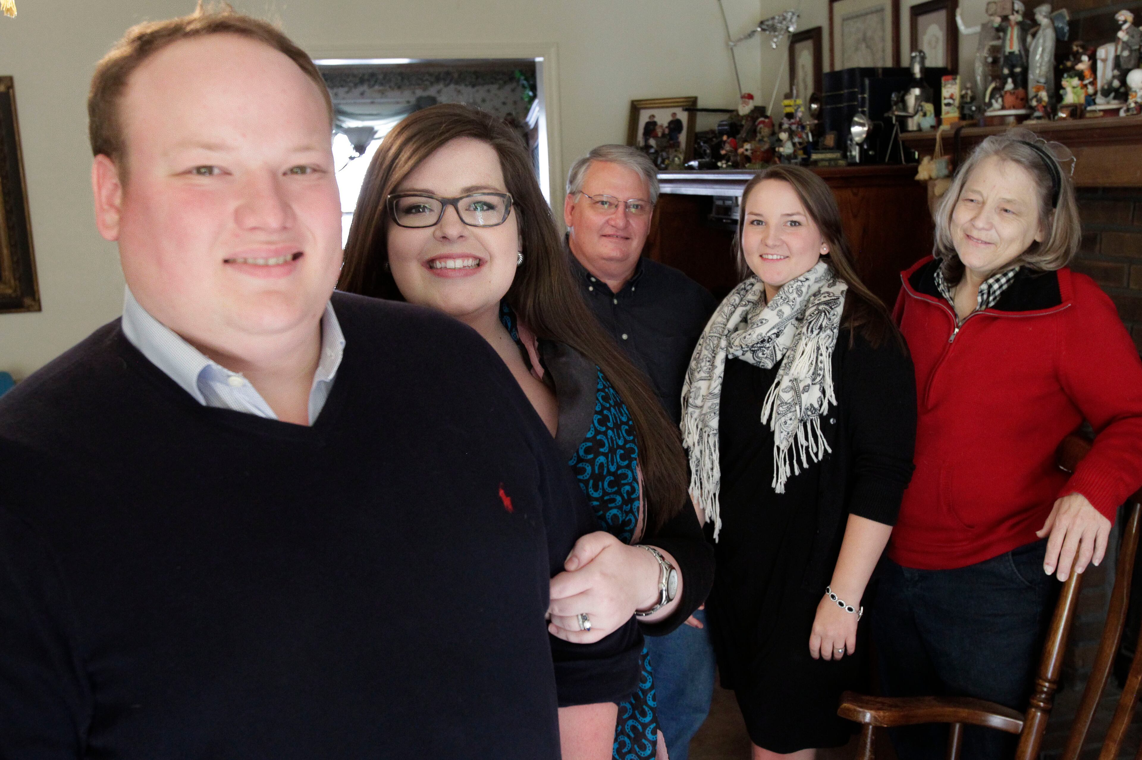 Christopher Routh (left); his wife, Emily; father, Charlie; sister, Emily; and mother, Sissy.