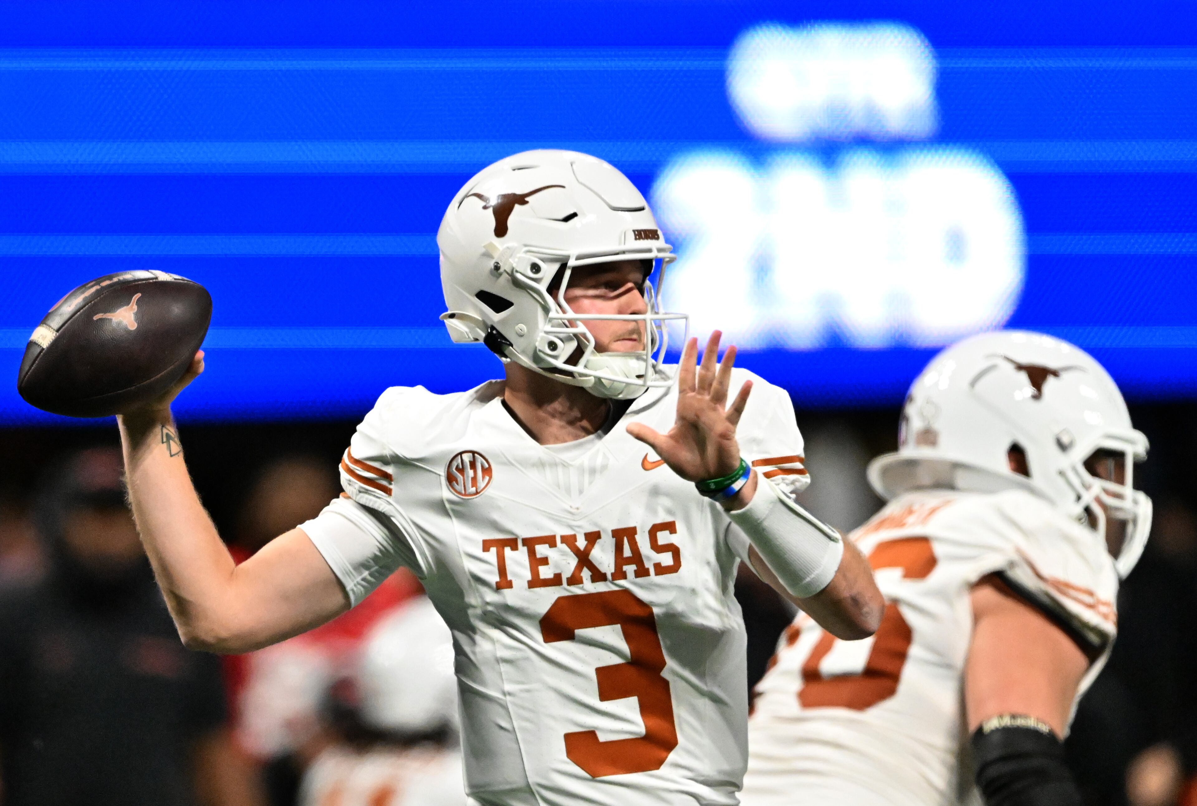 Texas quarterback Quinn Ewers (3) throws a pass during the SEC Championship football game at the Mercedes-Benz Stadium, Saturday, December 7, 2024, in Atlanta. (Hyosub Shin / AJC)