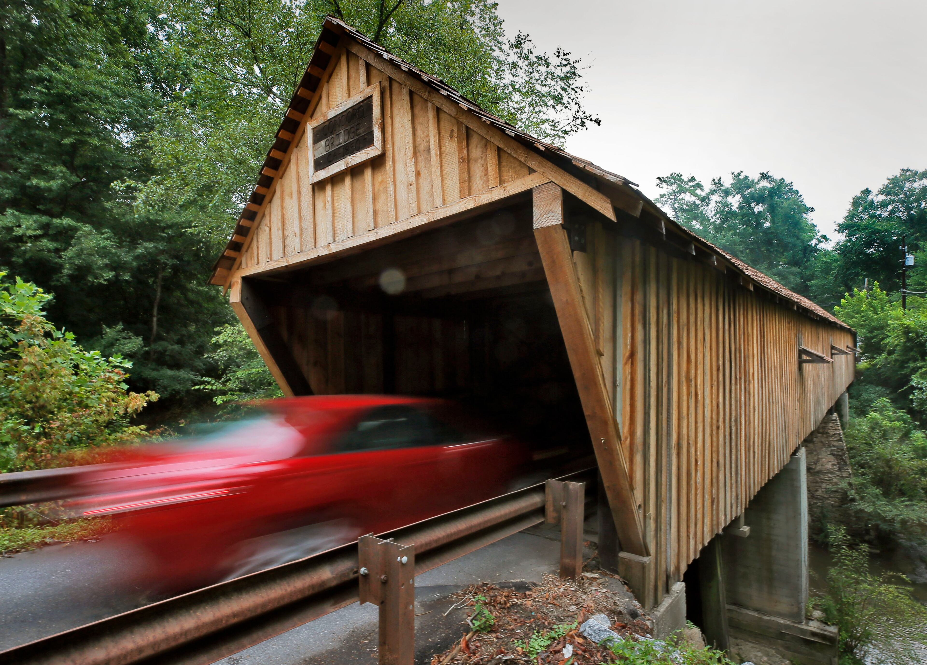 HISTORIC BRIDGE: - Smyrna - The Concord Covered Bridge over Nickajack Creek, a historic covered bridge that was entered into the the National Register of Historic Places in 1980, was renovated last fall for four months and at a cost of $802,000 SPLOST, funds. The bridge has a low clearance and gets hit multiple times per year, usually by rented trucks that don't clear the warning beam. The fee to fix the warning beams, which look like big yellow staples that indicate the seven-foot heights limit, is $800 and billed to the driver. BOB ANDRES /BANDRES@AJC.COM