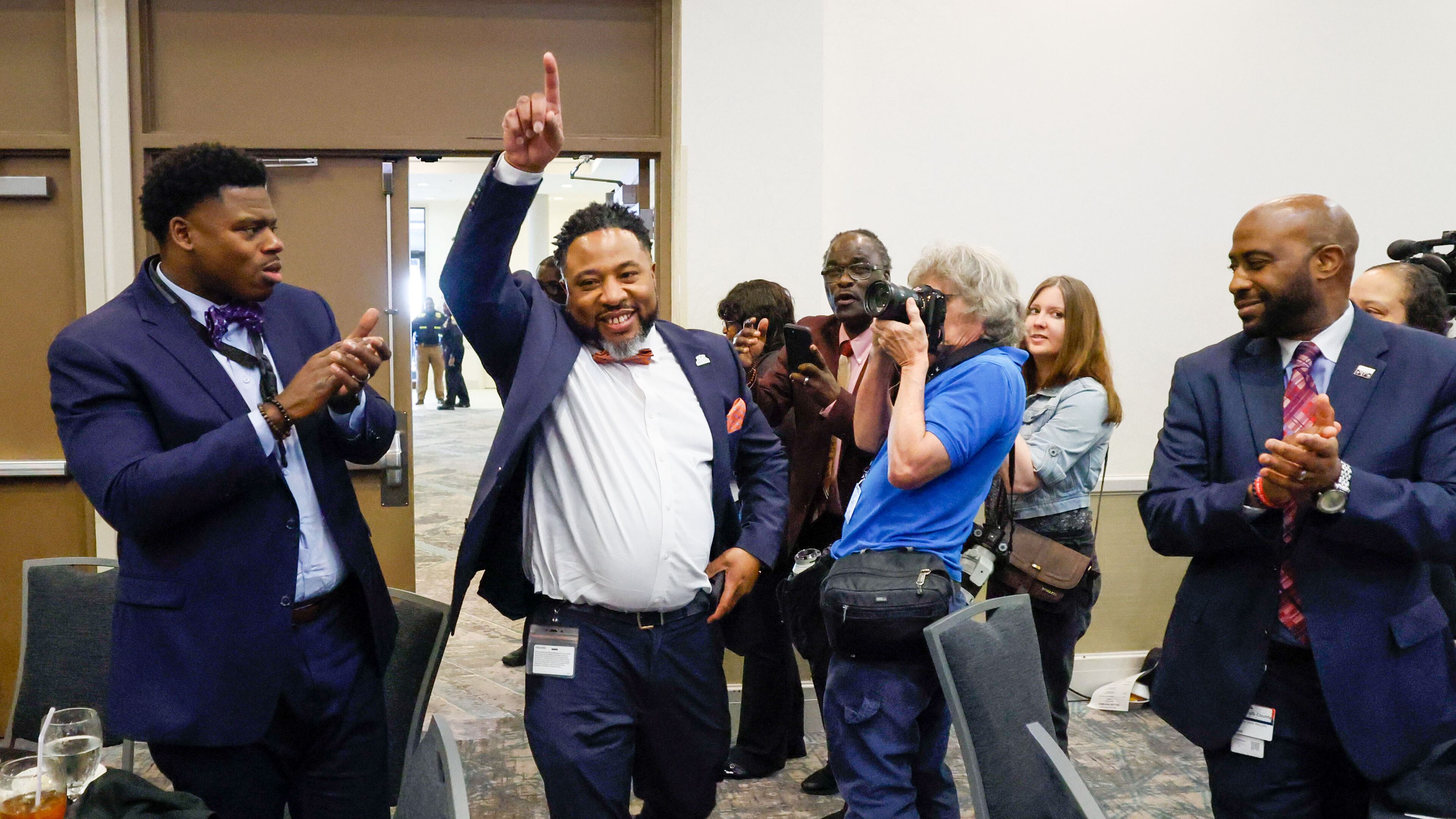 DeKalb County Superintendent Devon Horton enters the hall moments before the State of the District address March 14, 2024. (Miguel Martinez/AJC)